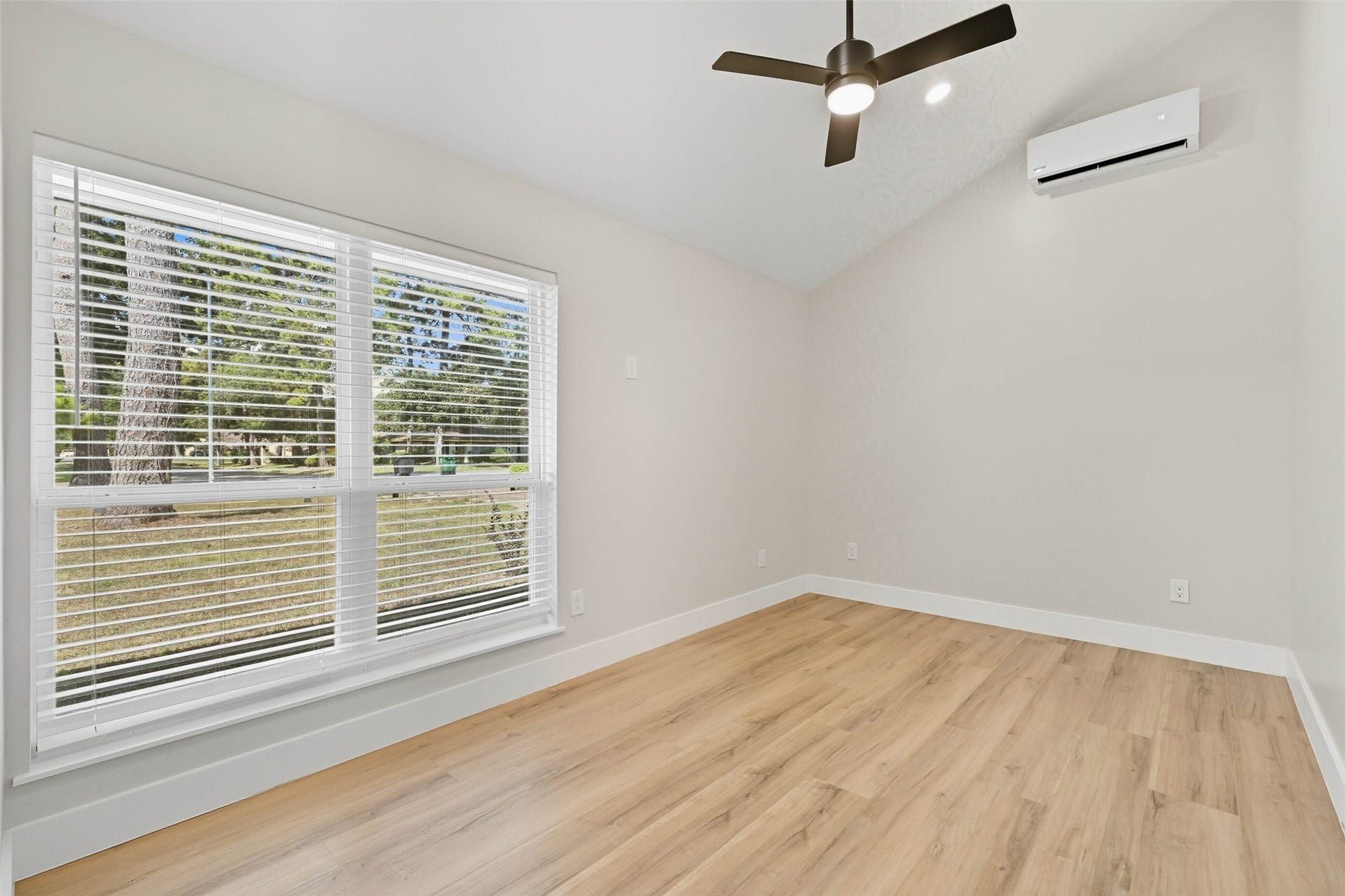 10930 White Thorn Street, #B, Houston, TX 77016 Spacious and inviting, the primary bedroomThis luxurious primary suite features refined finishes including crown molding, classic baseboards, and plantation shutters for added elegance. provides plenty of natural light and functionality to suit your needs.
