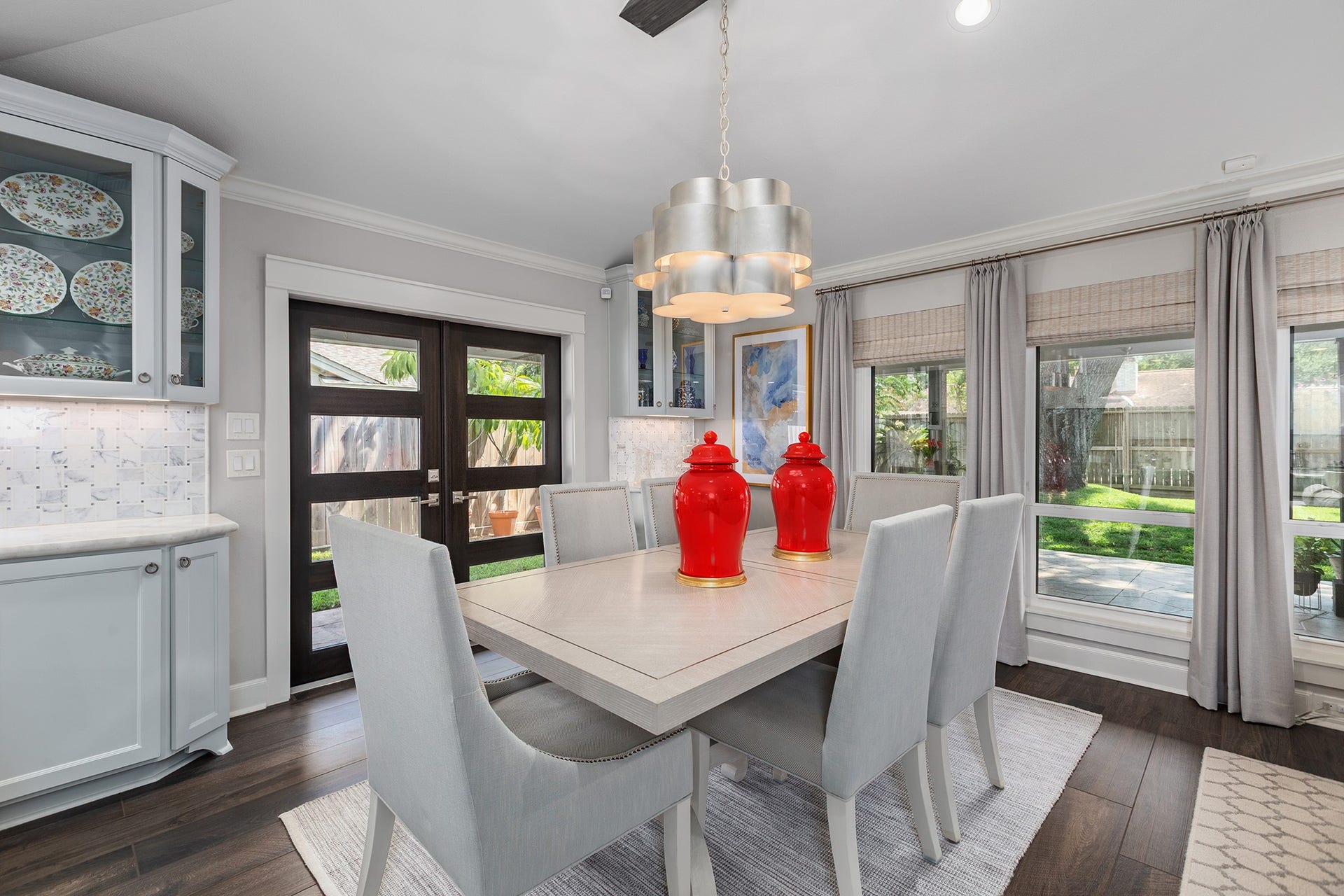 906 Eva Drive, Katy, TX 77493 Double doors lead out of the formal dining area into a wraparound back porch