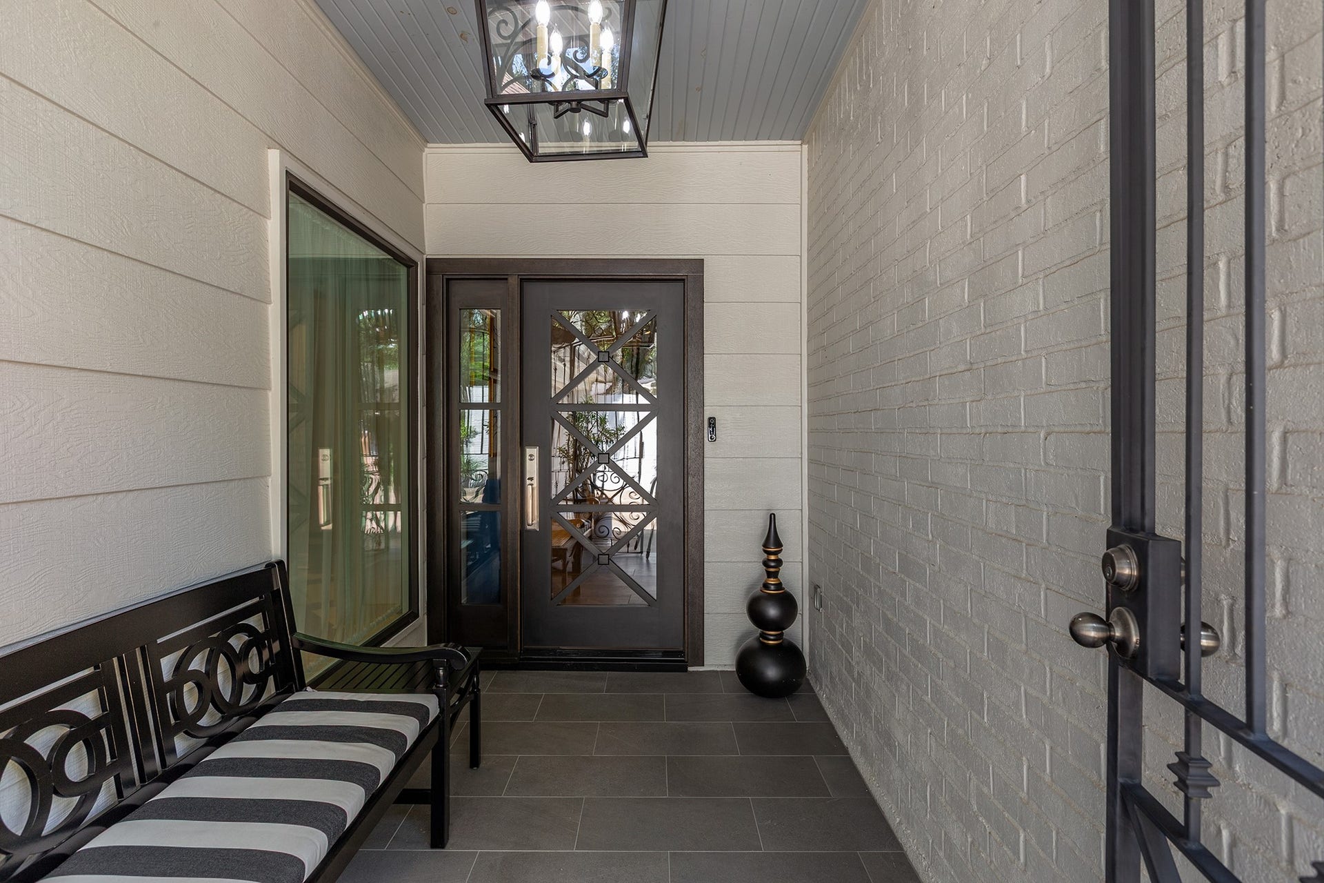906 Eva Drive, Katy, TX 77493 Gated front porch area with custom gate and front door