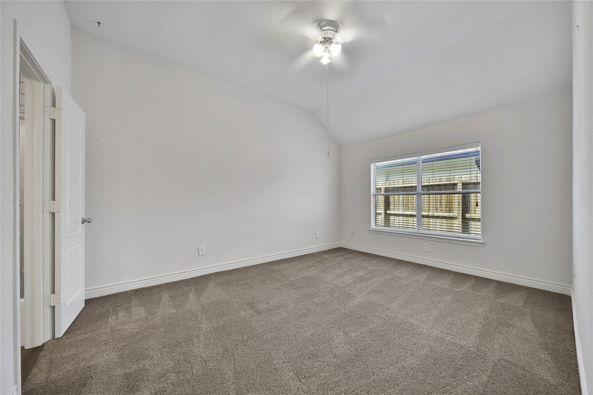 5918 Greenway Manor Lane, Spring, TX 77373 Inviting spacious secondary bedroom with abundant natural light.