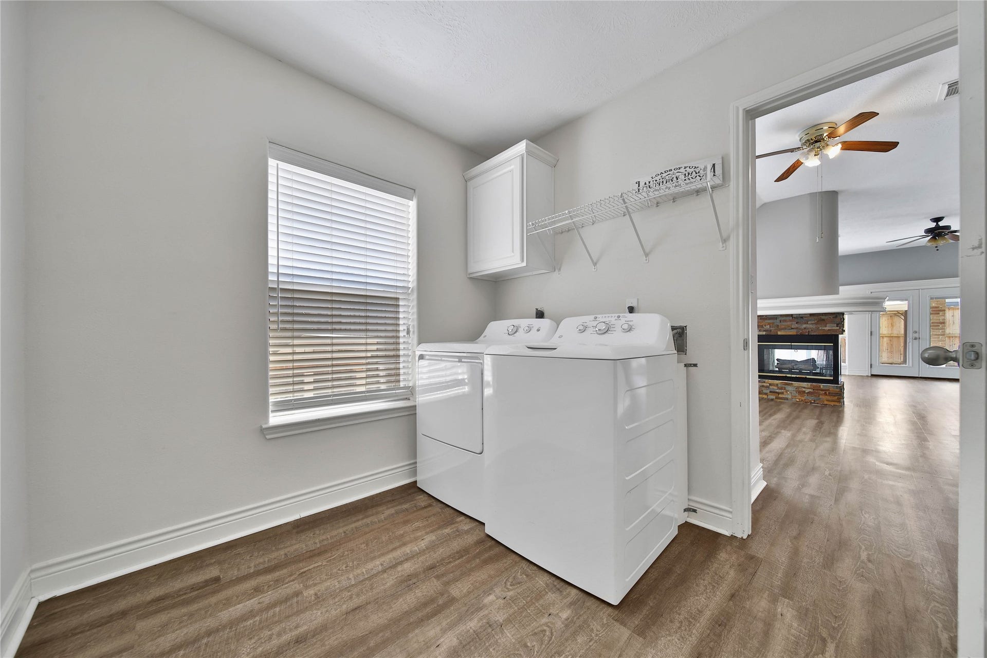 5918 Greenway Manor Lane, Spring, TX 77373 Bright and spacious laundry room with direct access from the garage and to the kitchen area.