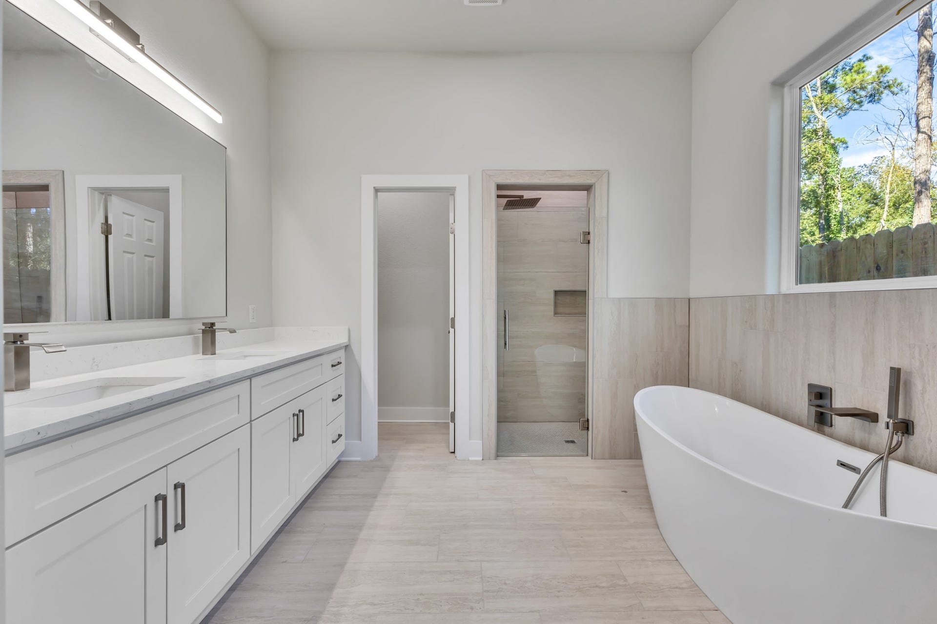 Primary Bathroom with Double Vanity and Freestanding Tub