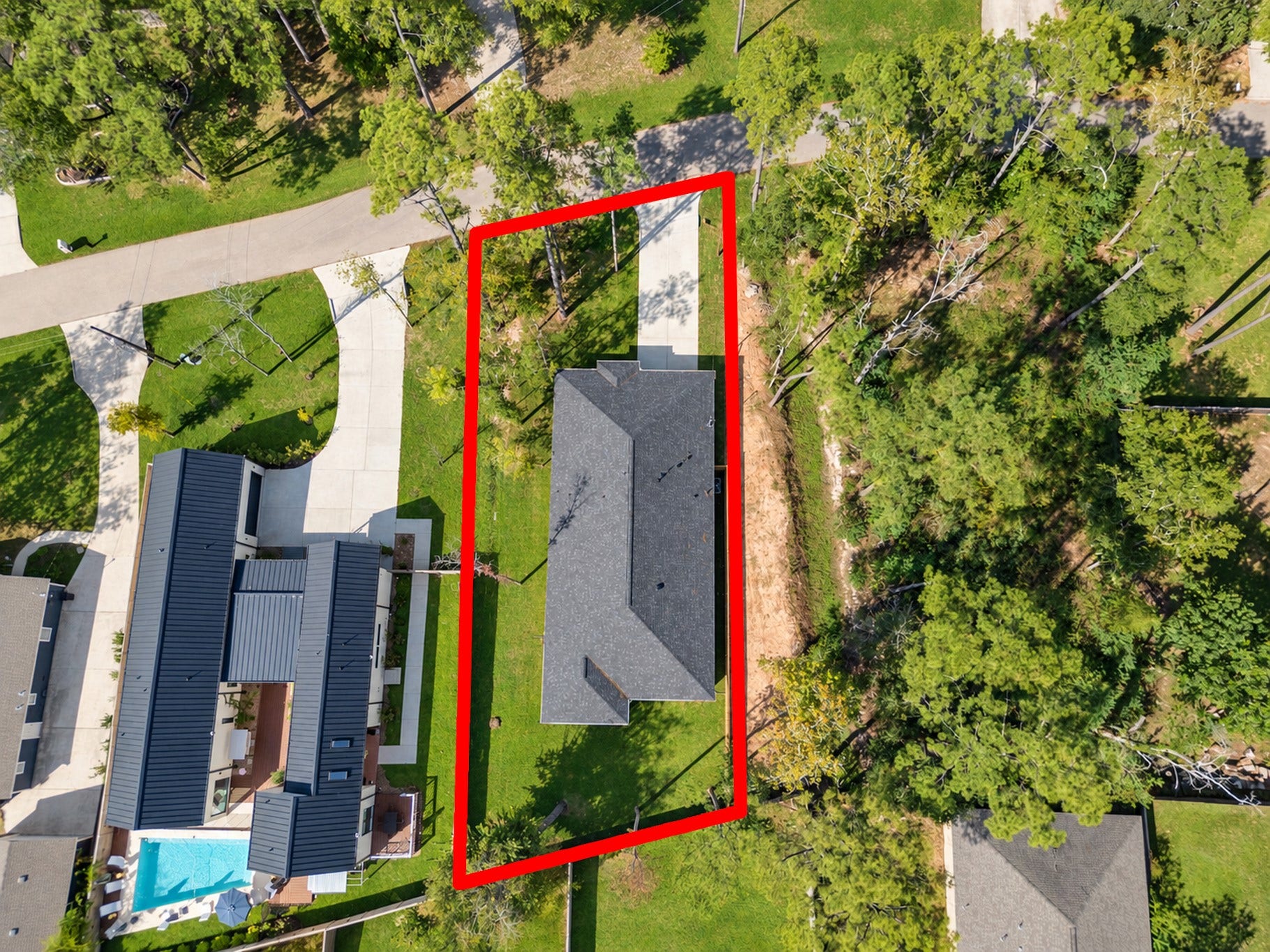 Aerial View of the Property and Surrounding Area