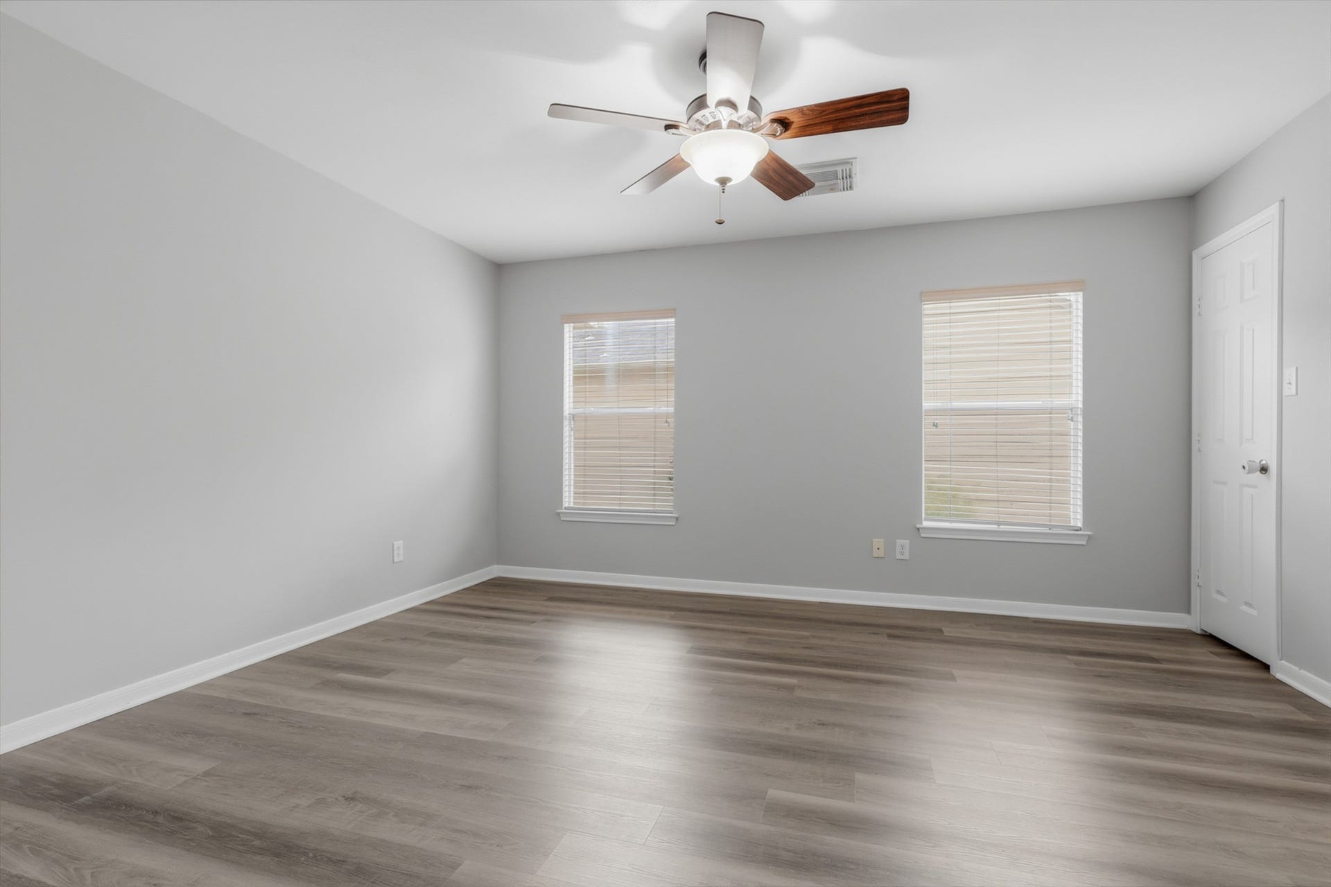 Bright Secondary Bedroom with Ceiling Fan