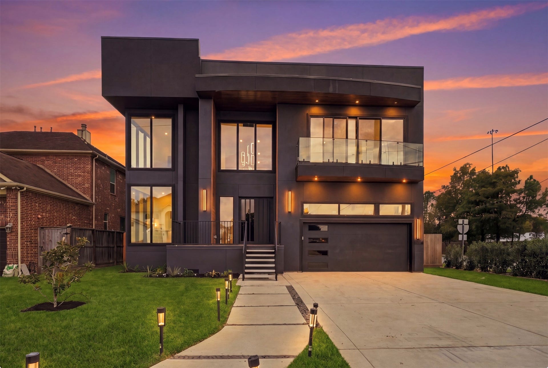 4629 Pine Street, Bellaire, TX 77401 Stunning modern exterior featuring contemporary architecture, expansive windows, and beautifully landscaped grounds.