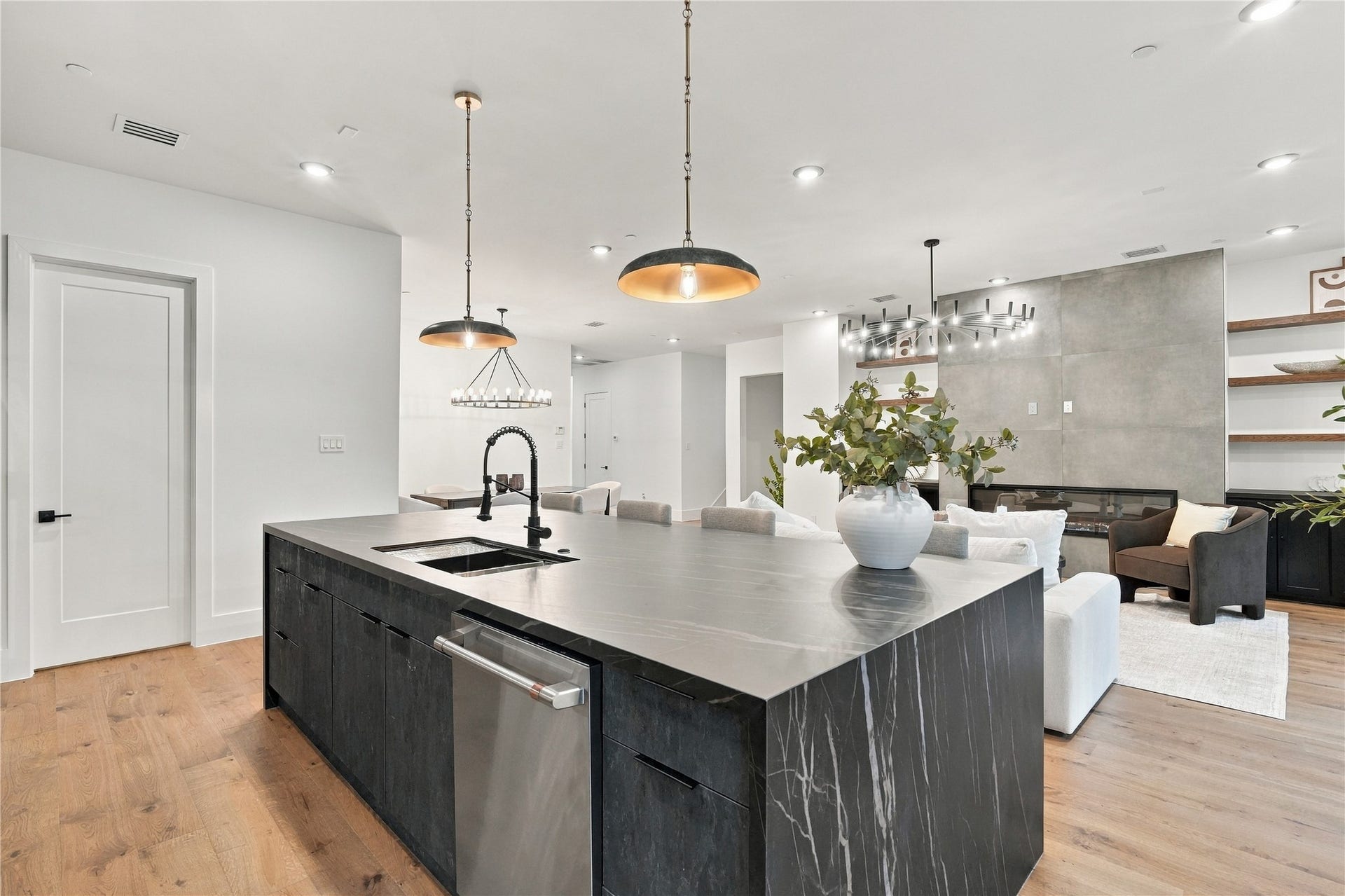 4629 Pine Street, Bellaire, TX 77401 Contemporary chefs kitchen showcasing a spacious island, premium finishes, and abundant natural light.