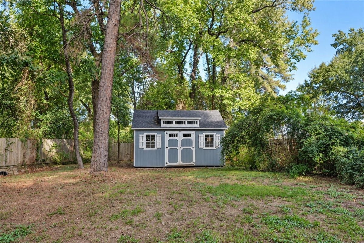 8514 Haven Way, Tomball, TX 77375 This shed offers convenient storage and extra workspace, set on a concrete base.