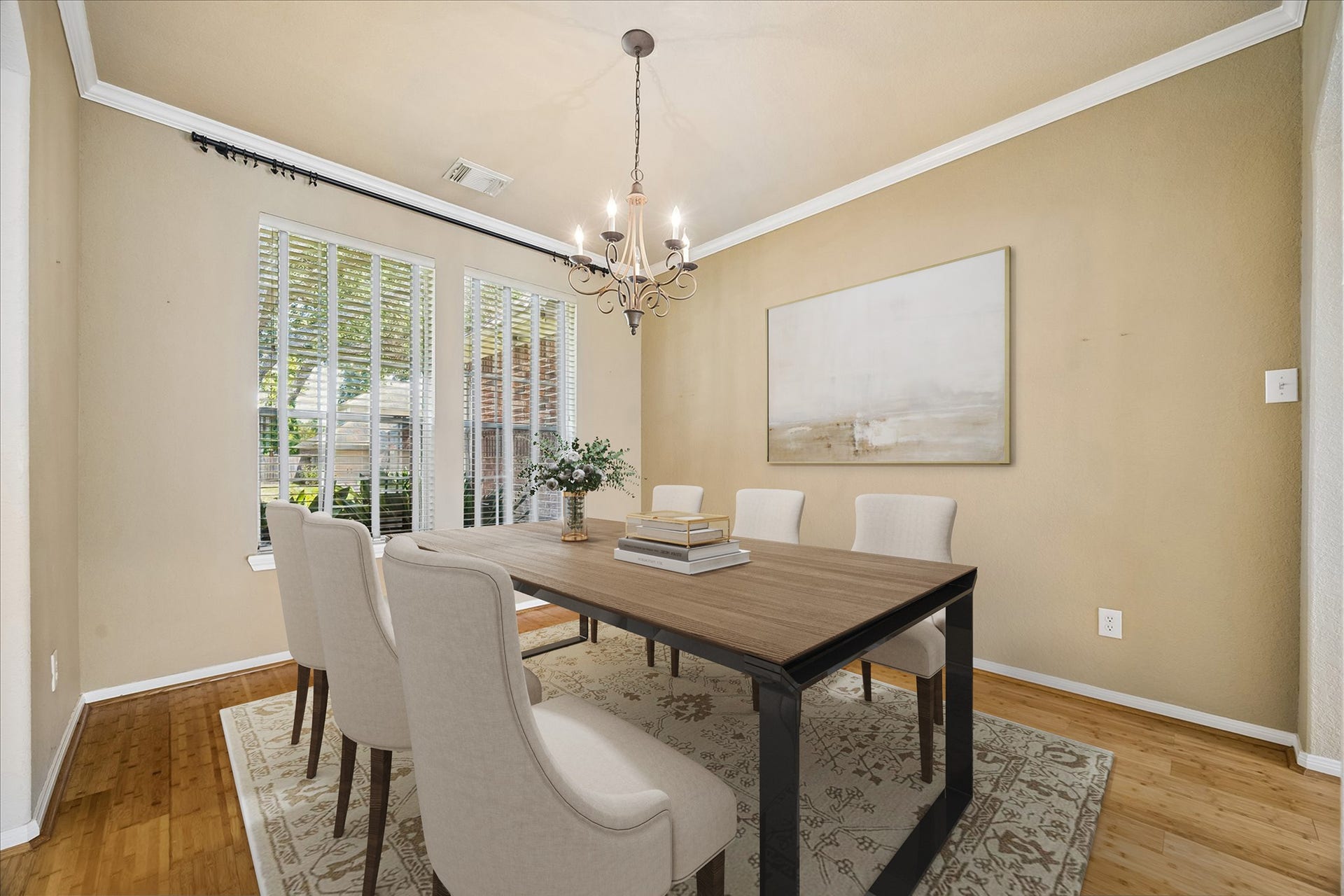 2843 Five Oaks Drive, Missouri City, TX 77459 Another look at the formal dining room highlights the bamboo flooring, large windows with front yard views, elegant chandelier and classic details that make this a comfortable place to wine, dine and chat.