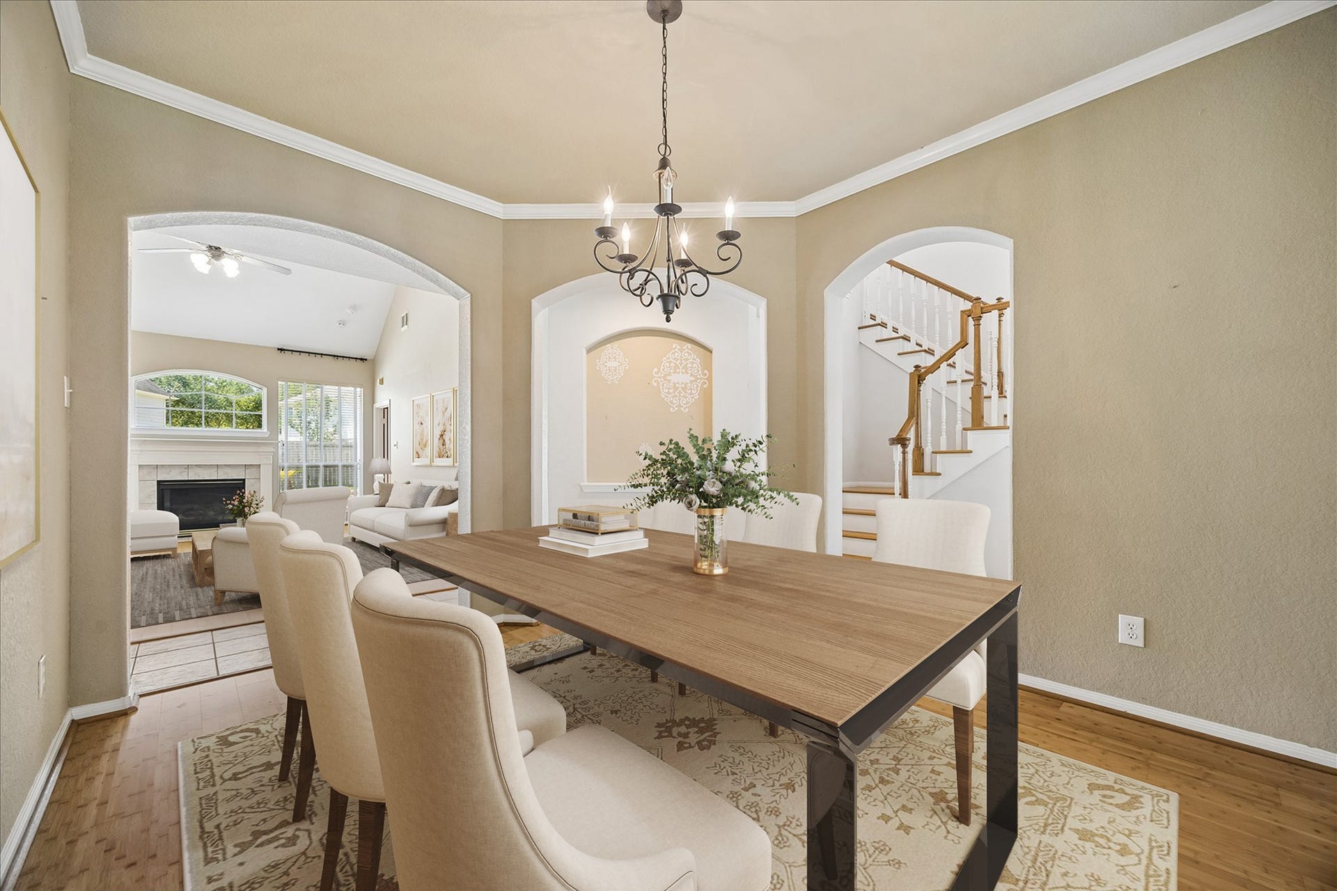 2843 Five Oaks Drive, Missouri City, TX 77459 A welcoming formal dining room sets the stage for everything from candlelit dinners to lively holiday gatherings, with warm bamboo flooring, crown molding, abundant natural light and an easy connection to the kitchen and main living areas.