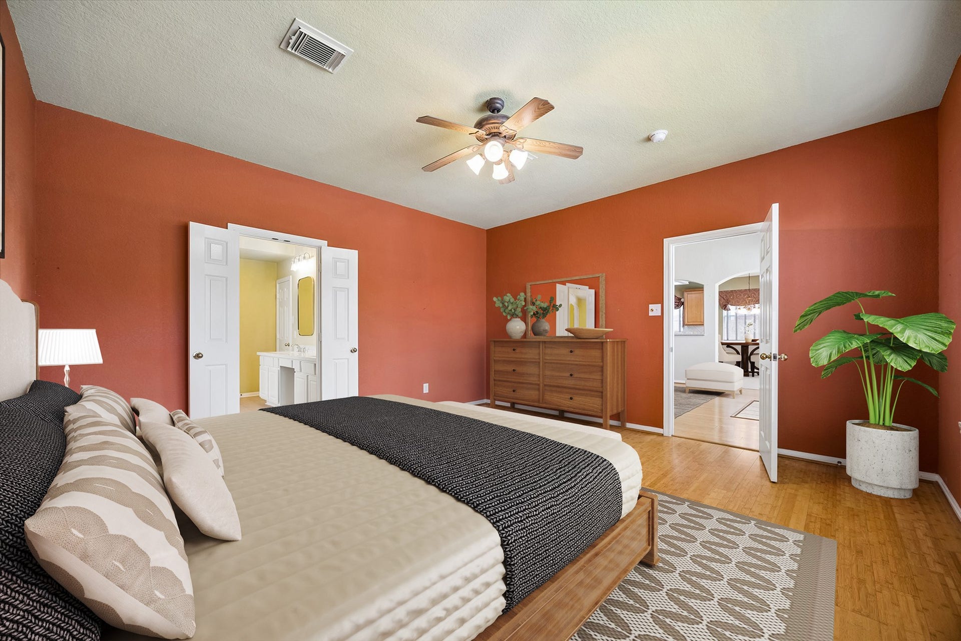 2843 Five Oaks Drive, Missouri City, TX 77459 Tucked away on the first floor, the spacious primary suite offers a relaxing retreat with warm bamboo flooring, designer paint, a large walk-in closet, and private access to the spa inspired ensuite.