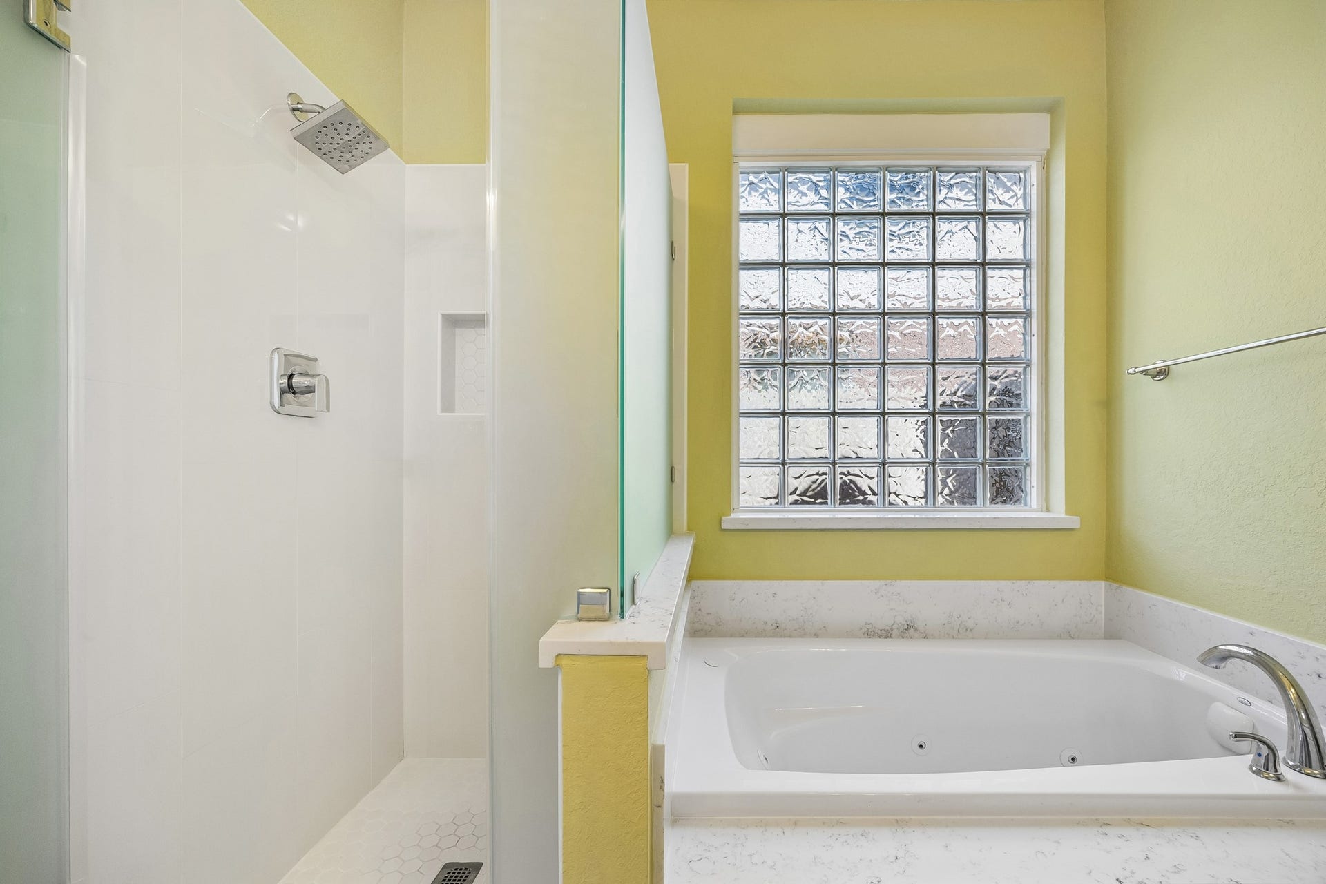 2843 Five Oaks Drive, Missouri City, TX 77459 Soak away the day in the deep jetted tub or refresh in the separate walk-in shower with frosted glass and sleek fixtures. Either way, you're going to love this relaxing private retreat.
