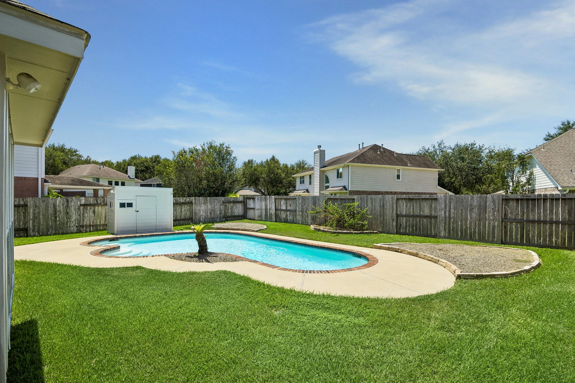 2843 Five Oaks Drive, Missouri City, TX 77459 Make a splash in your own backyard with a sparkling 33-foot inground pool that offers plenty of room for swimming, water games or simply cooling off from the Texas heat, with depths ranging from 3 to 8 feet.