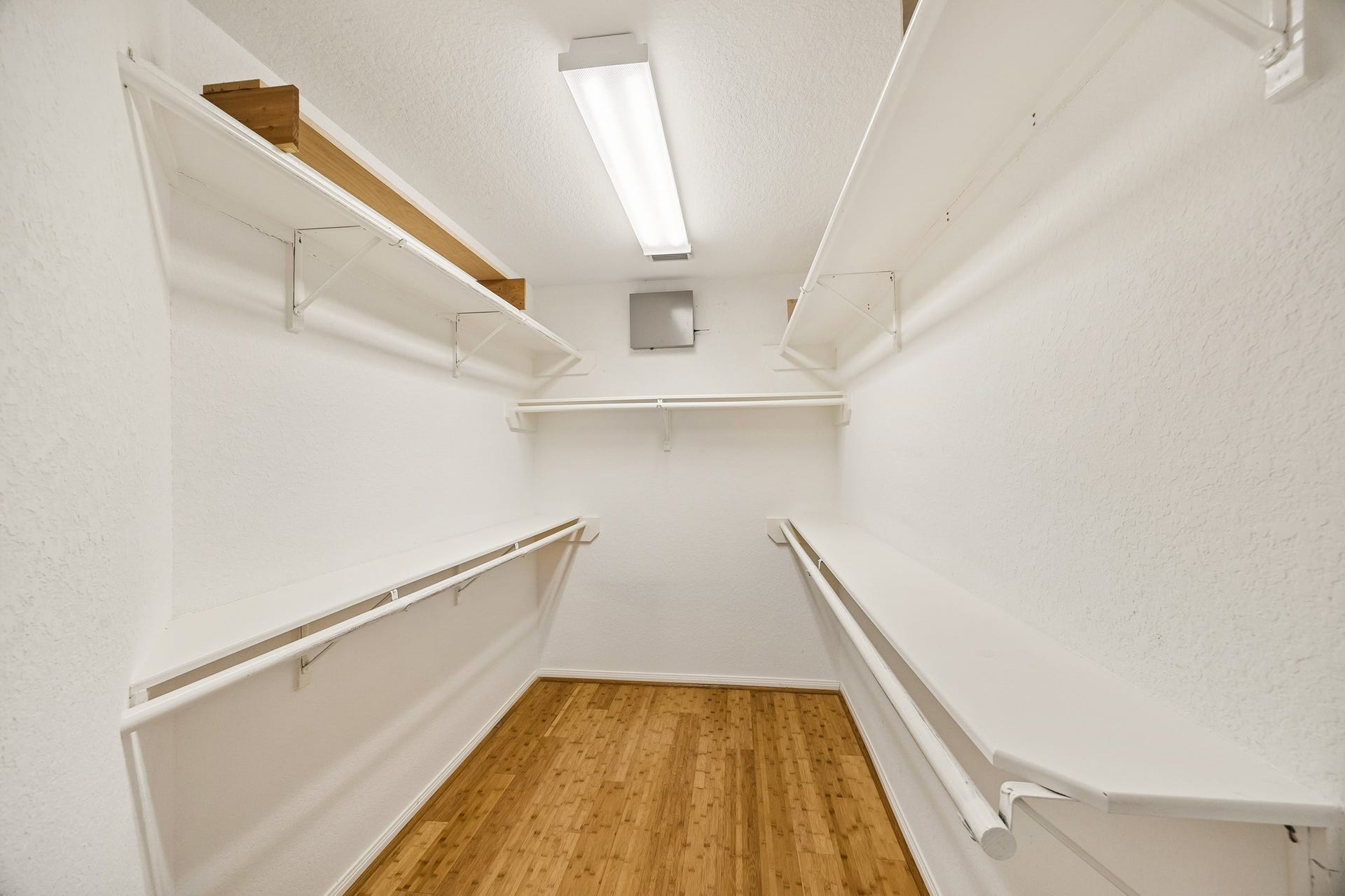 2843 Five Oaks Drive, Missouri City, TX 77459 Go ahead, shop until you drop! This deep walk-in closet can take it with ample hanging bars for clothes and shelving for all the extras.