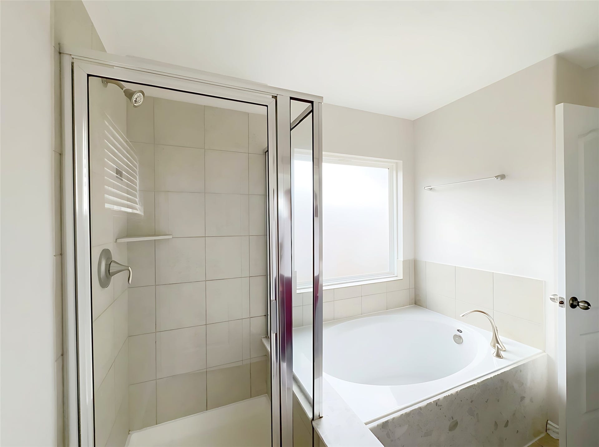 662 W Linnwood Drive, Woodbranch, TX 77357 Primery Bathroom - 2st Floor - double vanity with sleek countertops, a spacious glass-enclosed shower, and a luxurious soaking tub