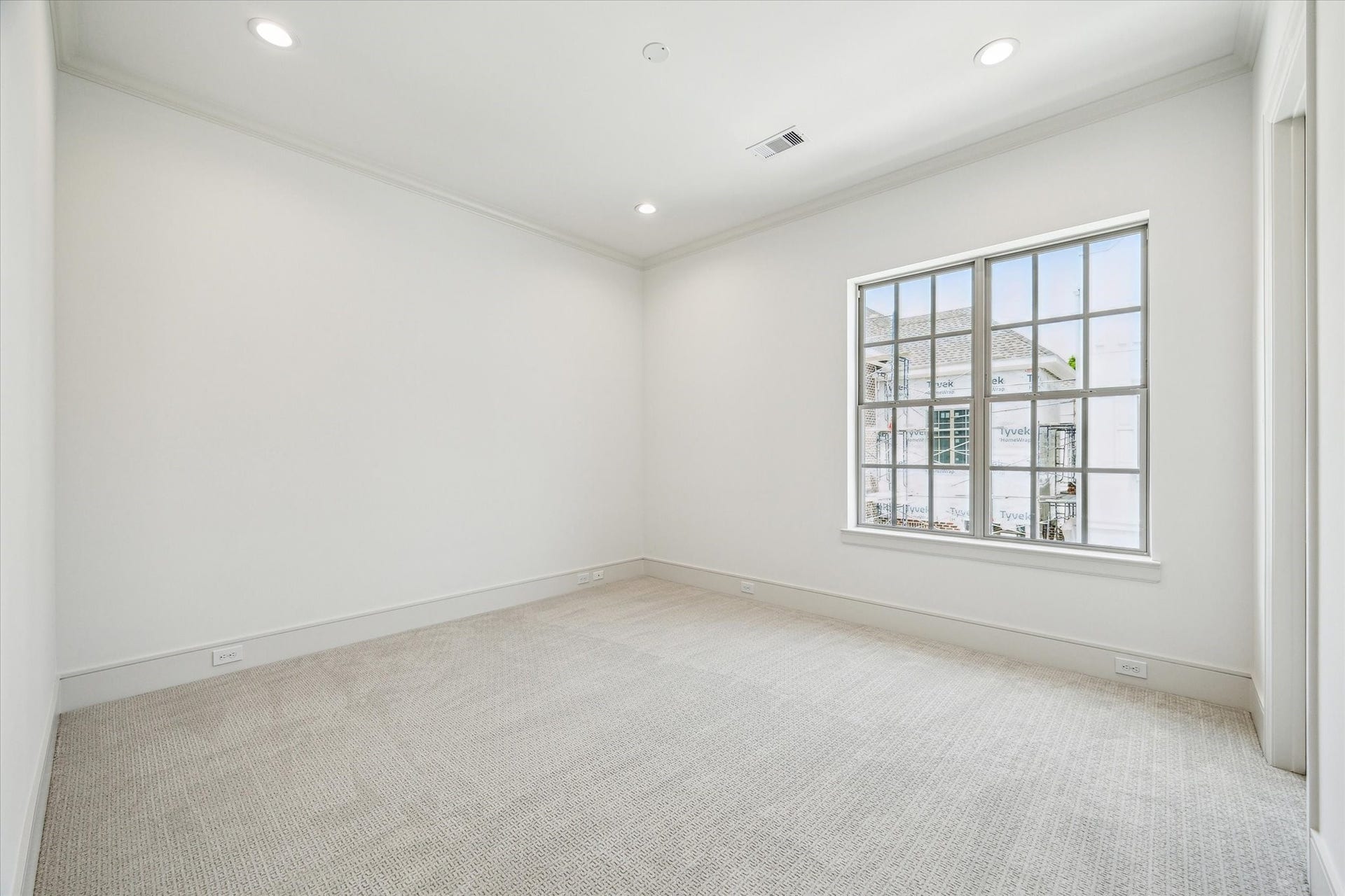 209 Sutton Row Place, Houston, TX 77024 Second-floor Secondary Bedroom with walk-in closet, a perfect space for an office or guest room.