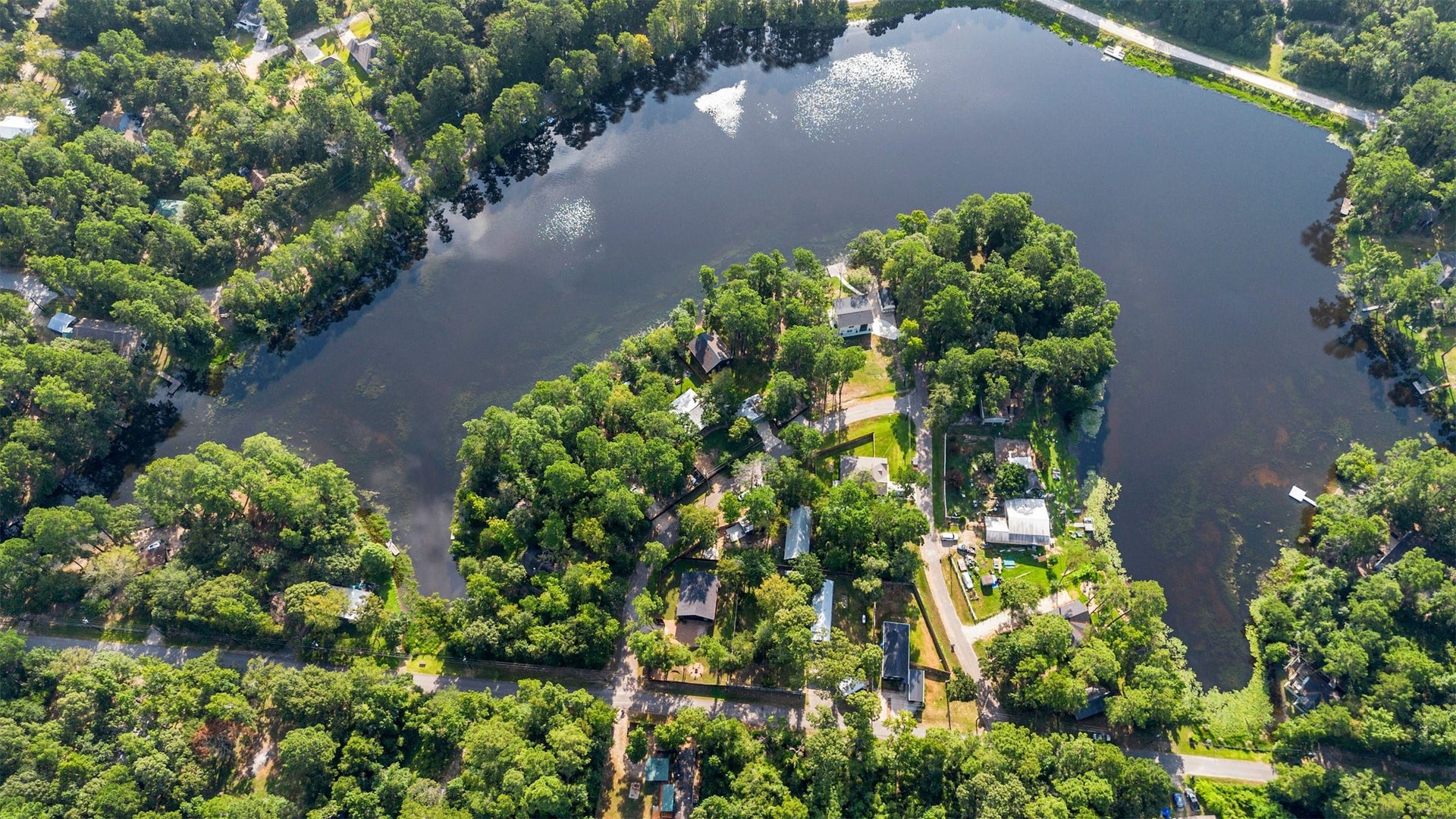 15693 Aspen Dr Drive, Montgomery, TX 77356 Neighborhood Lake fully stocked and just walking distance from the lot