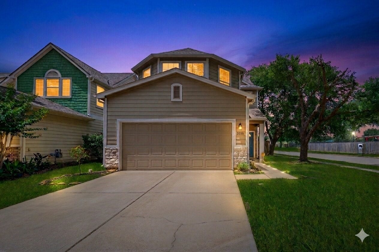 26130 Ripley Hills Drive, Richmond, TX 77406 Charming two-story home with a spacious driveway and attached garage. Features a well-maintained lawn and mature trees, set against a picturesque evening sky. Ideal for family living in a serene neighborhood.