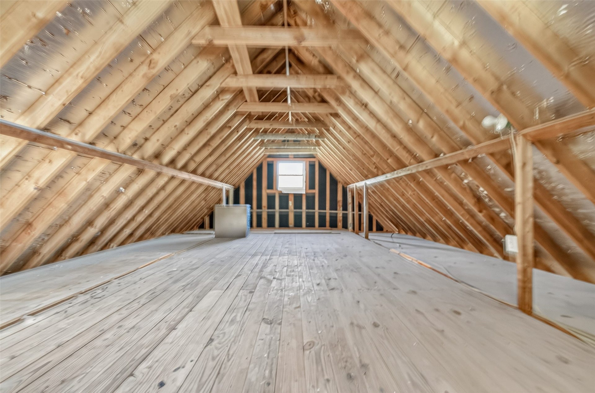 SO MUCH MORE THAN STORAGE! WOW! Take a look at the extensive floored attic space above the detached garage! With its soaring roofline, wood-plank flooring, window overlooking the driveway & radiant barrier beneath the roof decking, this is an incredible bonus area. Currently unfinished, this generous space offers plenty of storage, but imagine the possibilities! With appropriate improvements, it could potentially be finished out as a home office, workshop, hobby room or creative retreat. WHAT WOULD YOU DO?
