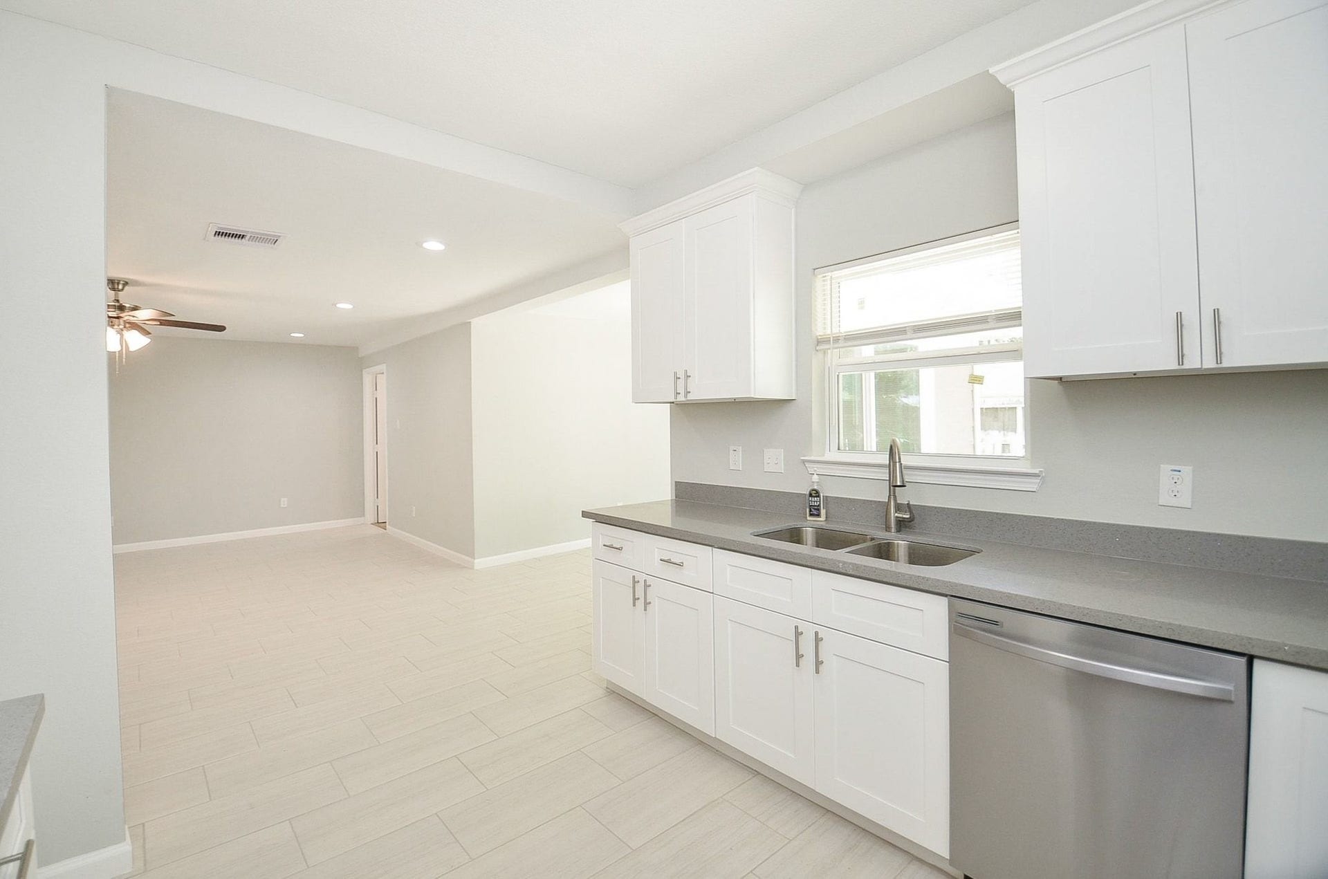 29502 Stapleford Street, Spring, TX 77386 A large window above the huge double sink allows natural light to flood the space. Easy access to the living and dining space.