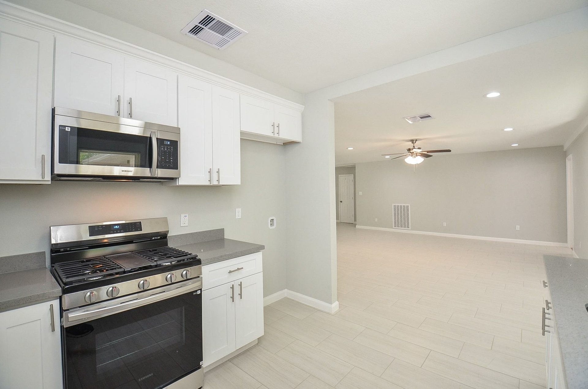 29502 Stapleford Street, Spring, TX 77386 The kitchen is equipped with stainless steel appliances and beautiful tile flooring.