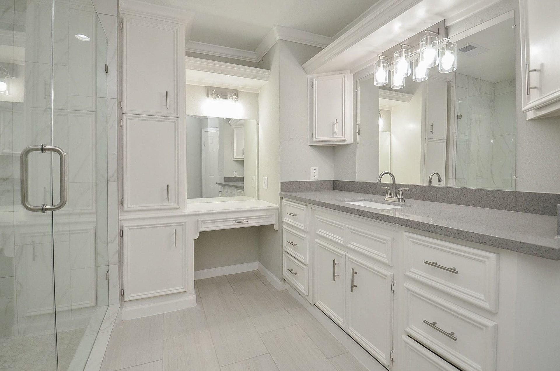 29502 Stapleford Street, Spring, TX 77386 Welcome the primary bathroom. The beautiful grey countertops allow plenty of storage space along with an ample amount of cabinetry.