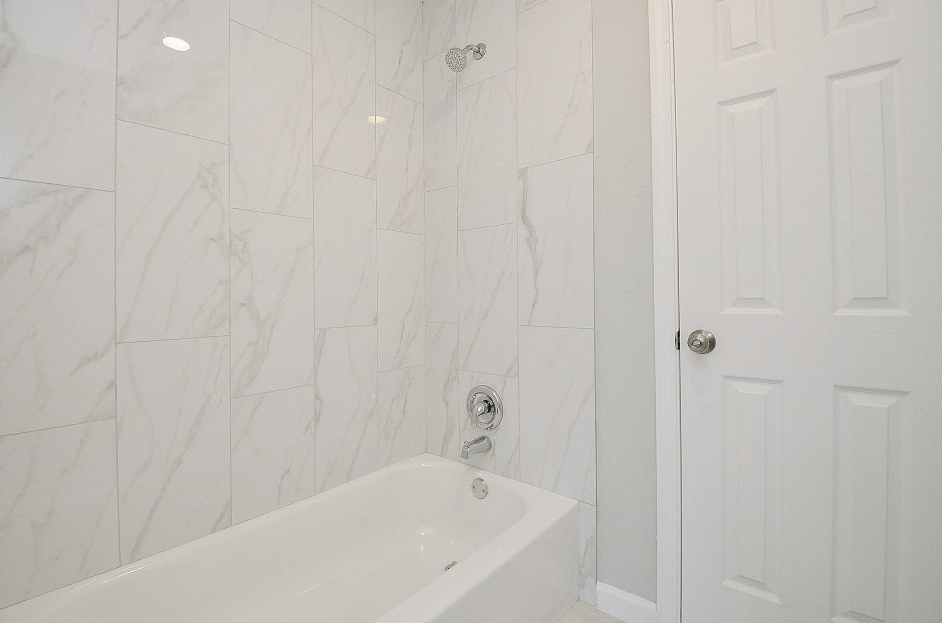29502 Stapleford Street, Spring, TX 77386 This shared bathroom has a shower/tub combination with the same beautiful shower wall as the primary bathroom.