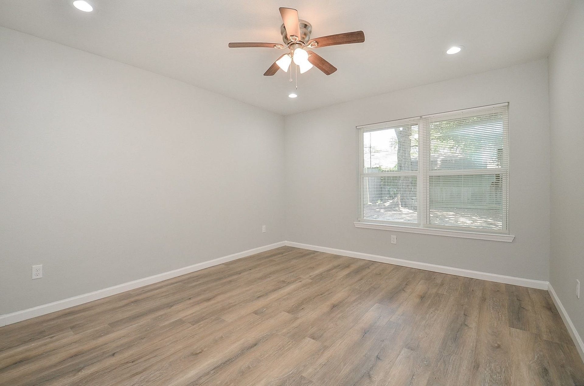 29502 Stapleford Street, Spring, TX 77386 The huge window gives this next bedroom the perfect touch to brighten up the room. This room is also equipped with a ceiling fan for comfortable temperatures year round