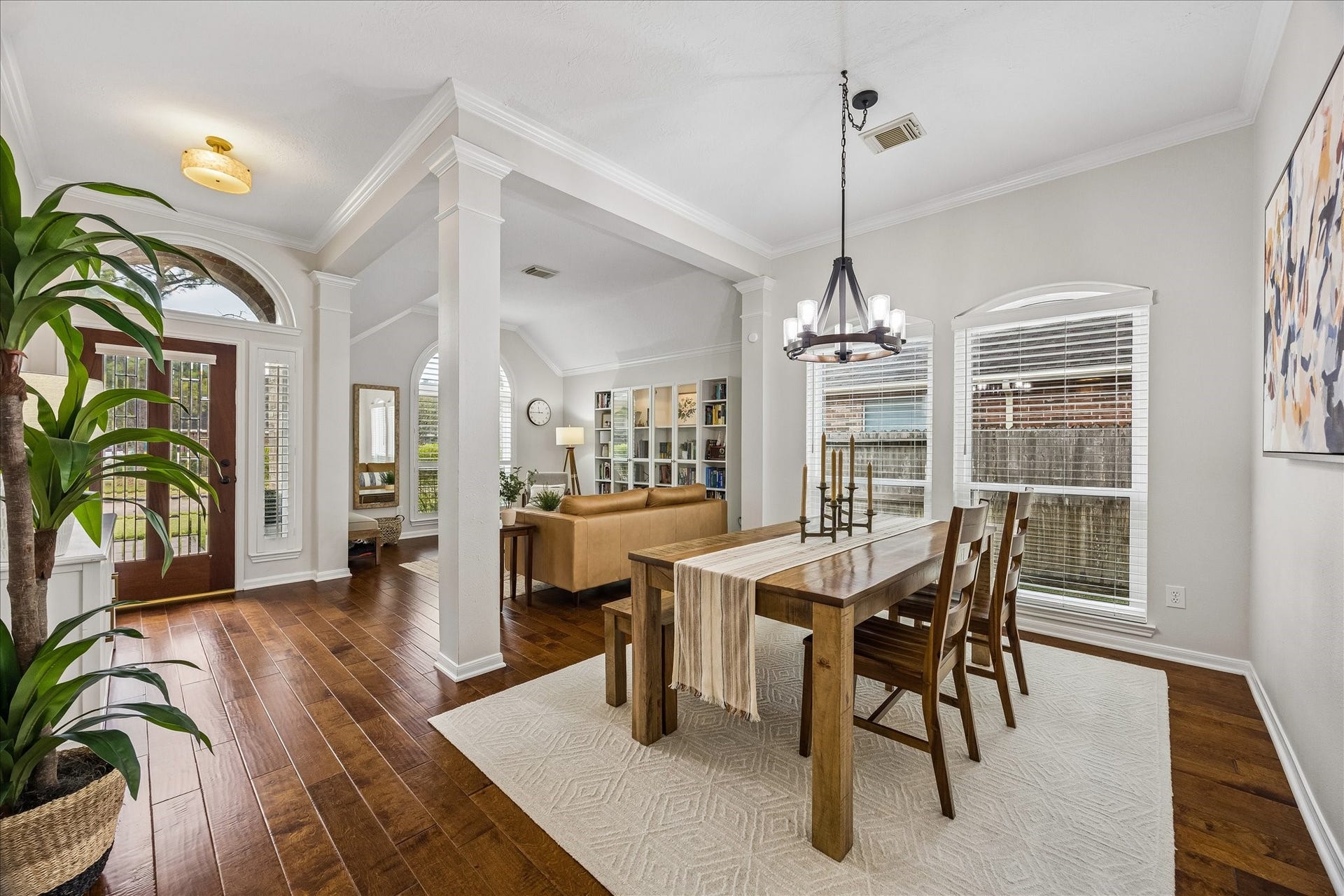4114 Stonehurst Drive, Pearland, TX 77584 An unforgettable first impression! Soaring ceilings, elegant architectural details, rich wood flooring, and abundant natural light create an inviting space that feels straight out of a designer showcase.
