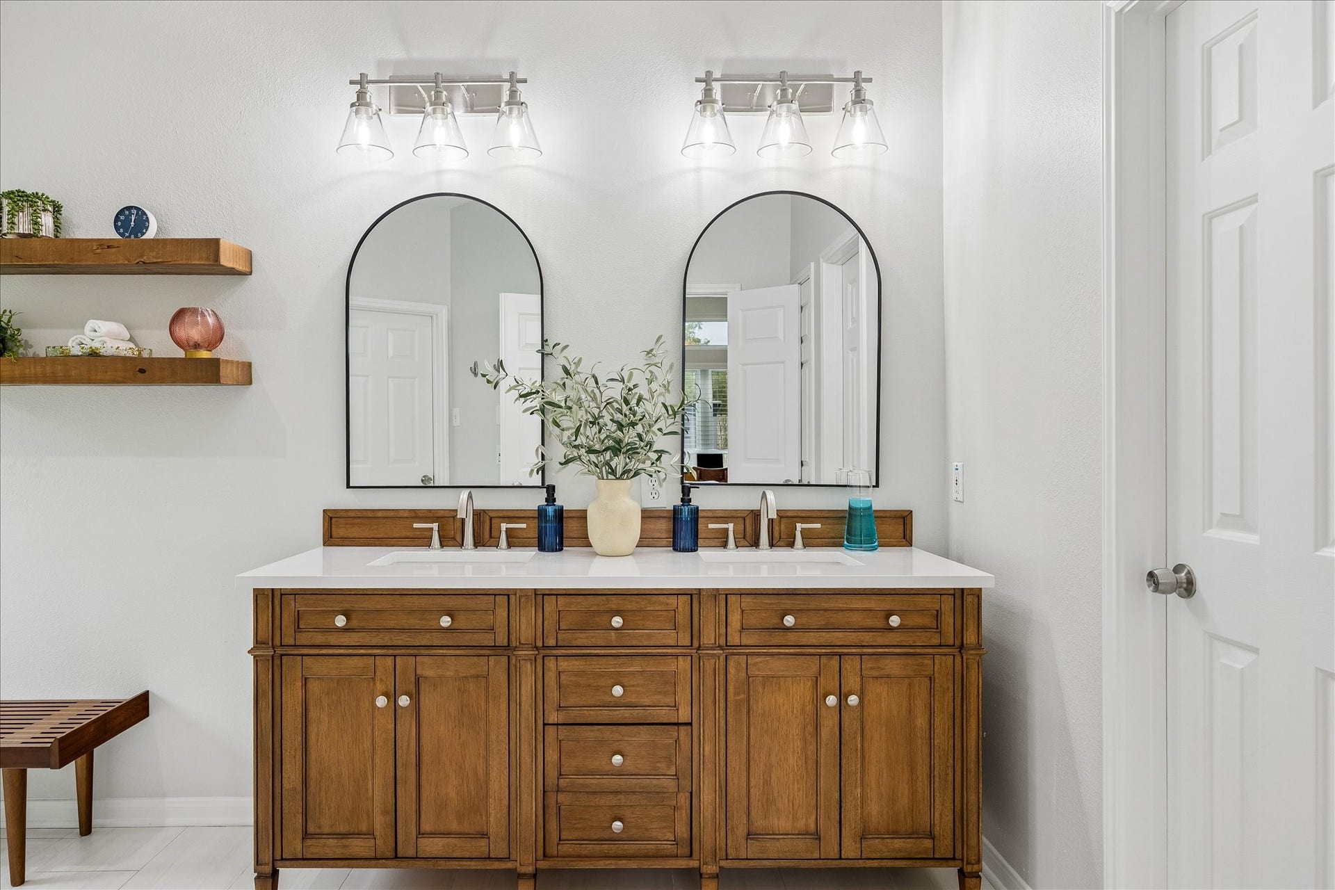 4114 Stonehurst Drive, Pearland, TX 77584 Luxury is in the details! This second view highlights the beautifully updated vanity area, featuring elegant quartz countertops, new cabinetry, stylish fixtures, and thoughtfully selected finishes from the homes extensive 2024 renovation.