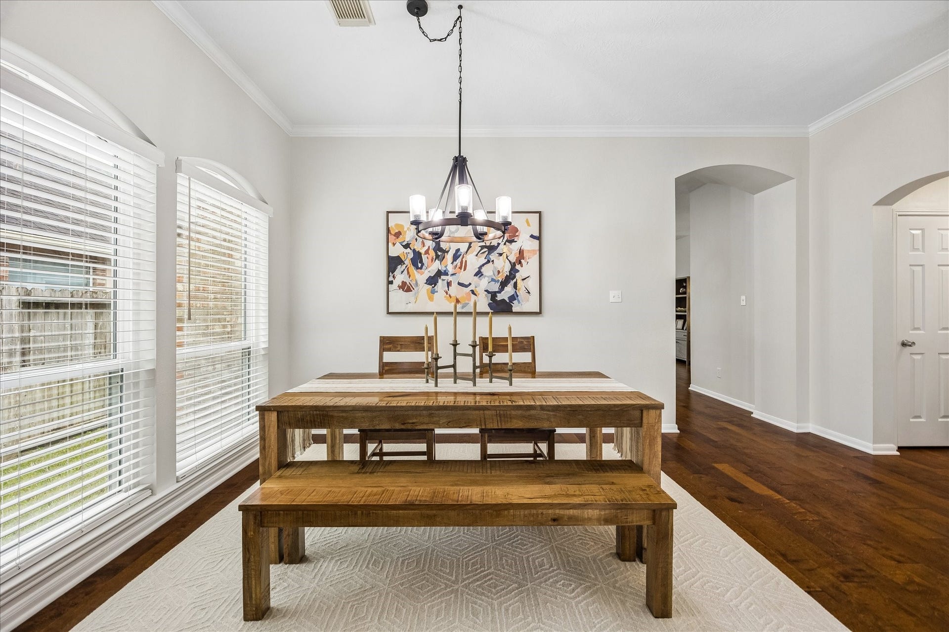 4114 Stonehurst Drive, Pearland, TX 77584 Host memorable dinners in this elegant formal dining room! A stylish statement chandelier, beautiful natural light, and generous space for gathering create the perfect setting for everything from intimate dinners to holiday celebrations.