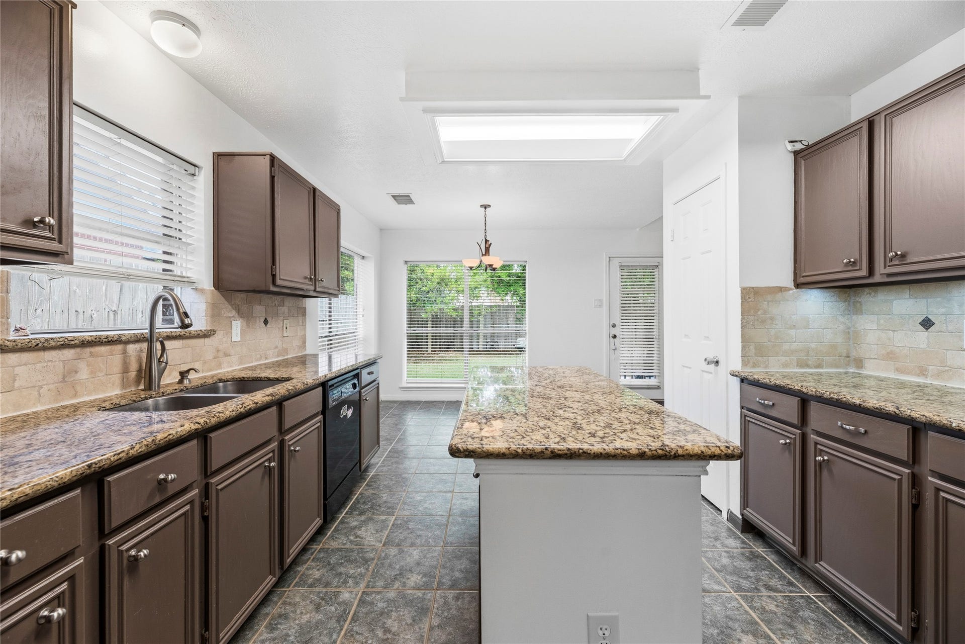 Spacious kitchen with an abundance of cabinet and counterspace.