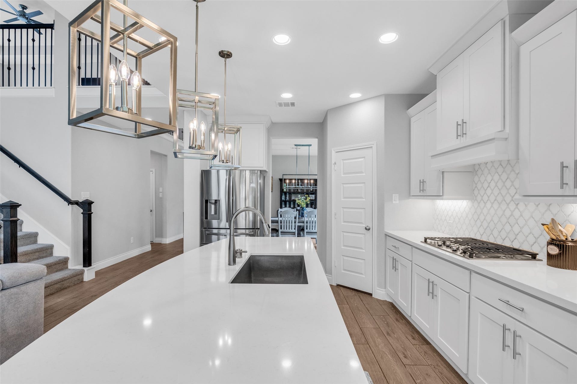 Luxury fixtures elevate this chef's kitchen