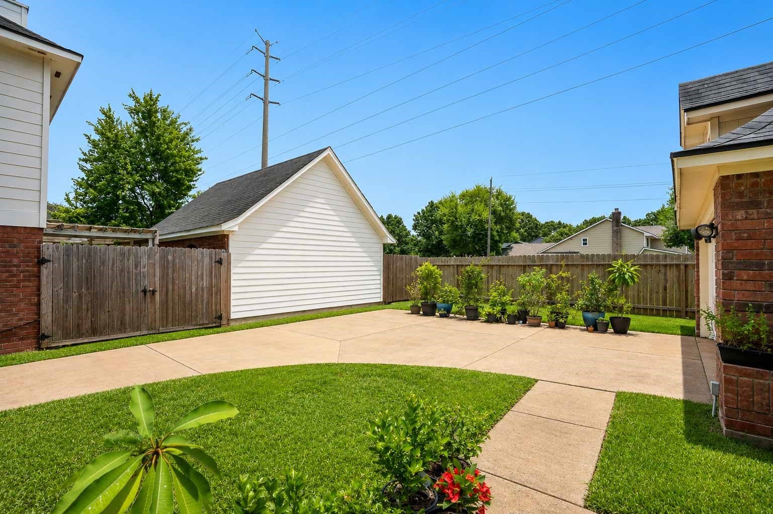 2306 Bent River Drive, Sugar Land, TX 77479 Backyard driveway