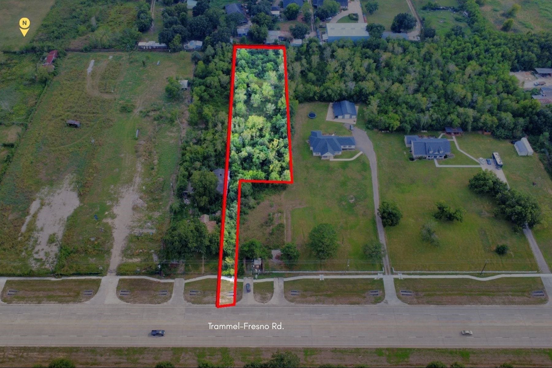 TBD Trammel Fresno Road, Fresno, TX 77545 An overhead view of the wooded tract along Trammel Fresno Rd. The approximate boundary lines are outlined in red. Check survey for exact tract.