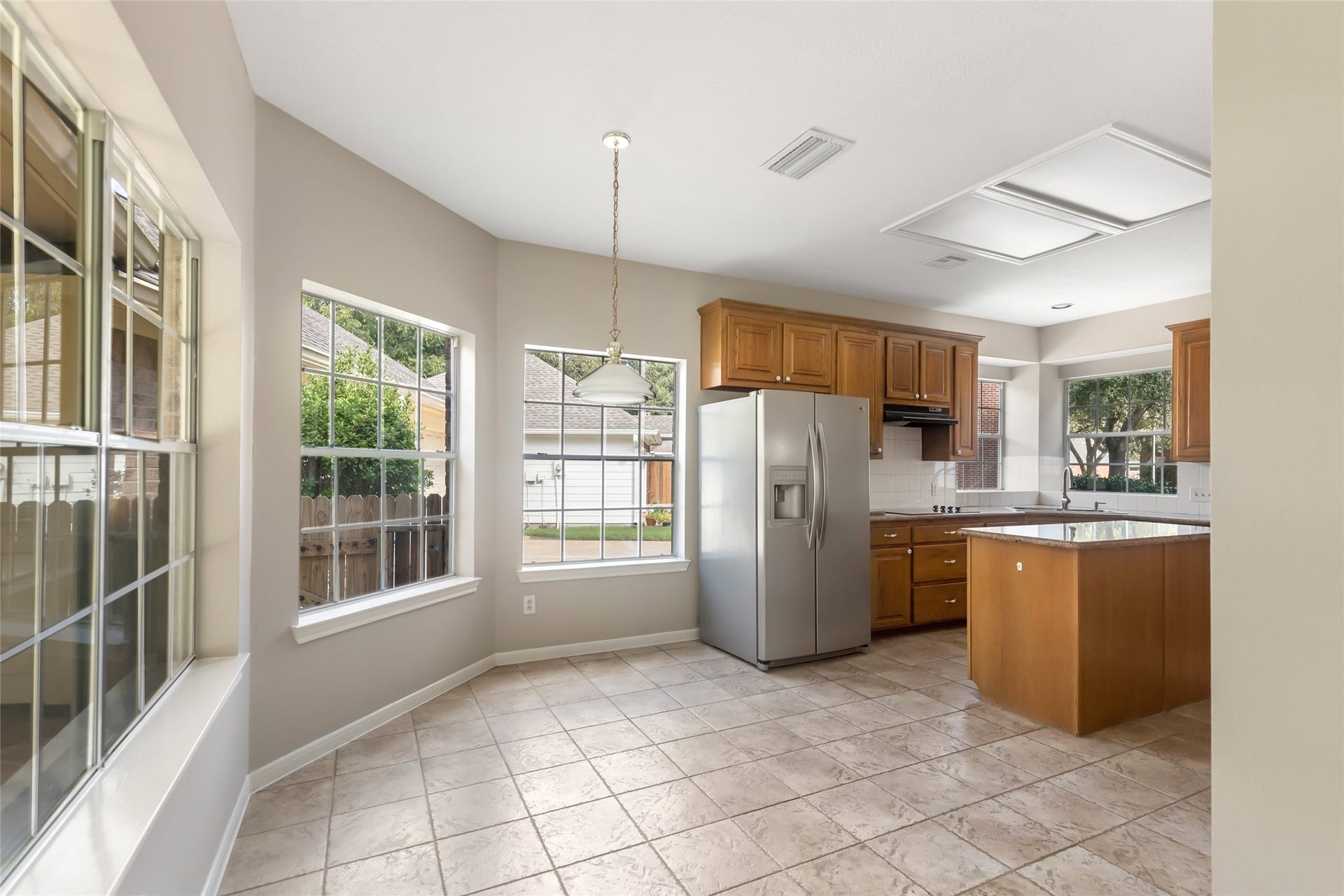 2007 Southern Place, Richmond, TX 77406 Breakfast nook with large windows overlooking the backyard