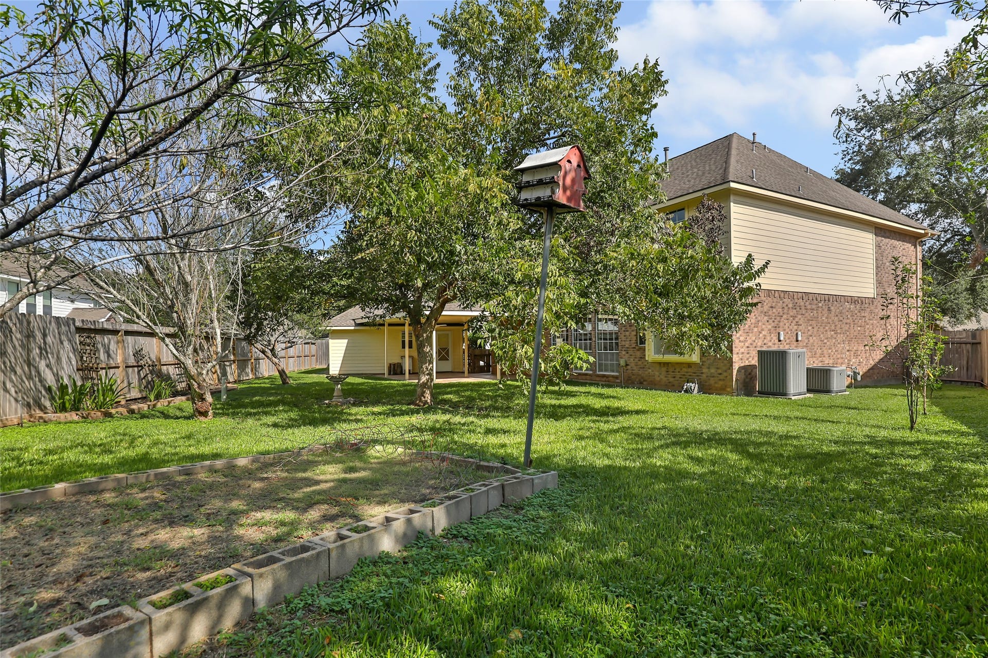 2007 Southern Place, Richmond, TX 77406 Backyard with raised gardening area