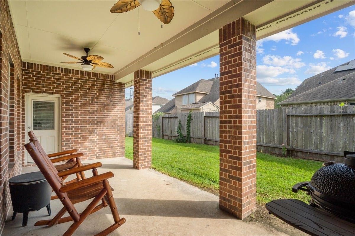 4329 S Meridian Greens Drive, Dickinson, TX 77539 Covered back patio, perfect for morning coffee or unwinding in the evening.