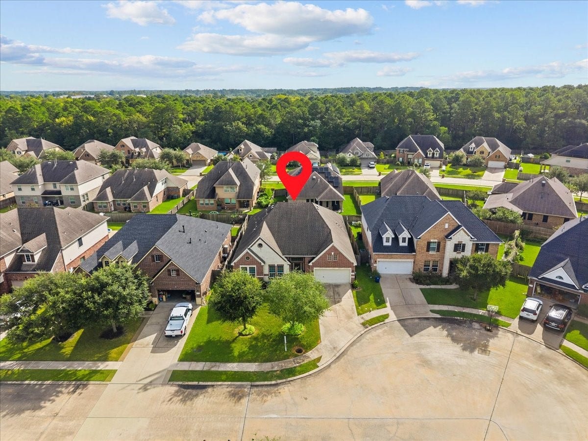 4329 S Meridian Greens Drive, Dickinson, TX 77539 Aerial view of the home within the neighborhood.