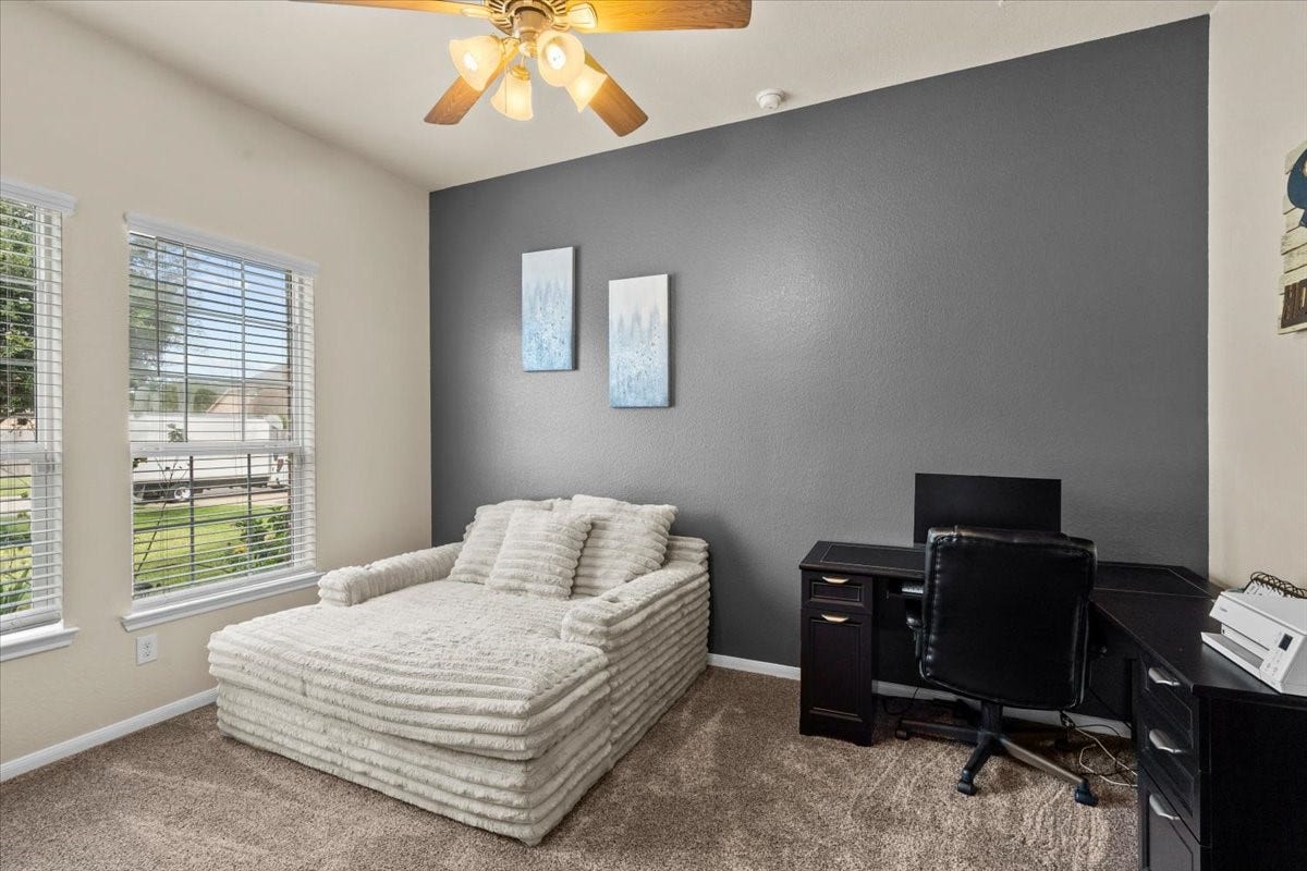 4329 S Meridian Greens Drive, Dickinson, TX 77539 Flexible room with accent wall, great as a home office, playroom, or second living area.