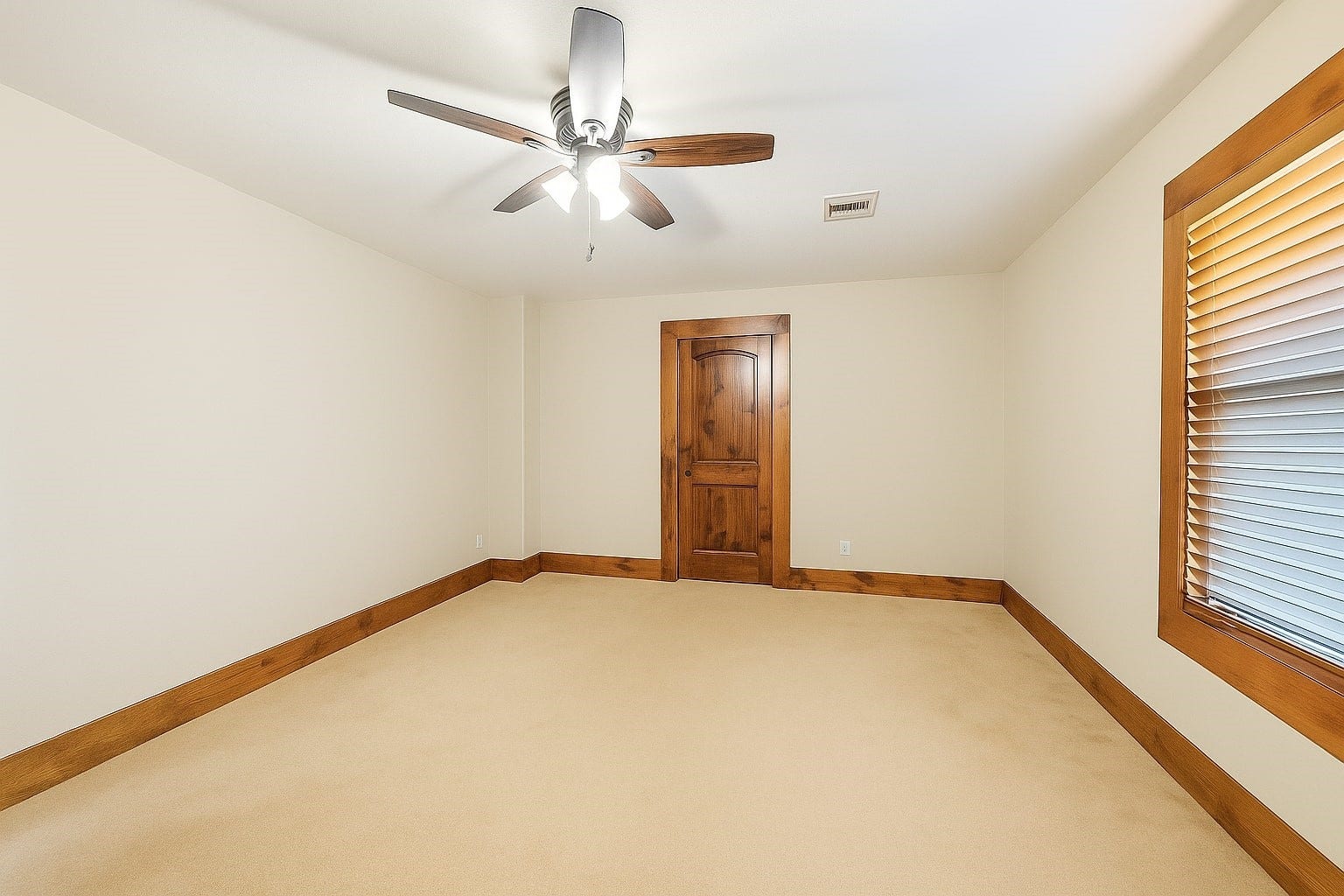 Another generously sized bedroom, ideal as a nursery or dual-purpose space, it offers room to grow while still feeling serene and cozy. Virtually decluttered to help visualize potential use.
