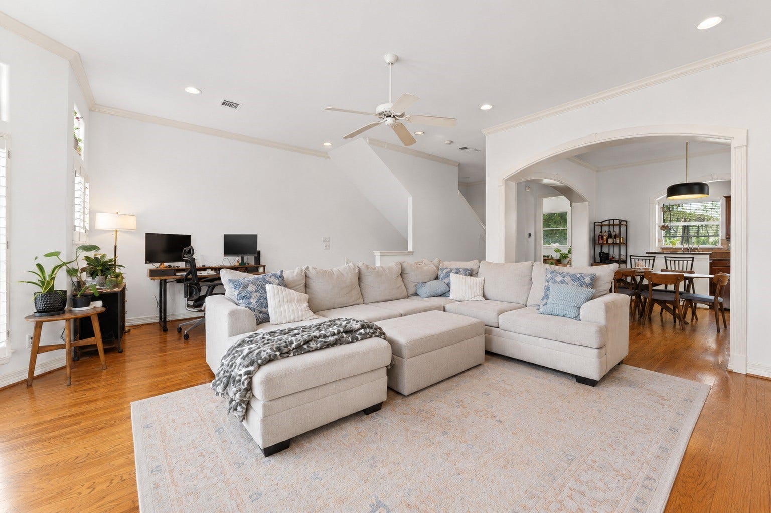 Open living dining kitchen area. Virtually staged/enhanced to show full potential