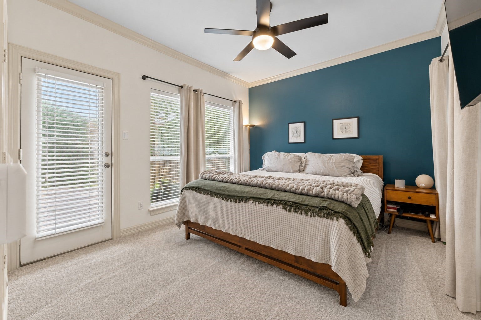 1st floor bedroom with access to backyard and patio. Virtually staged/enhanced to show full potential