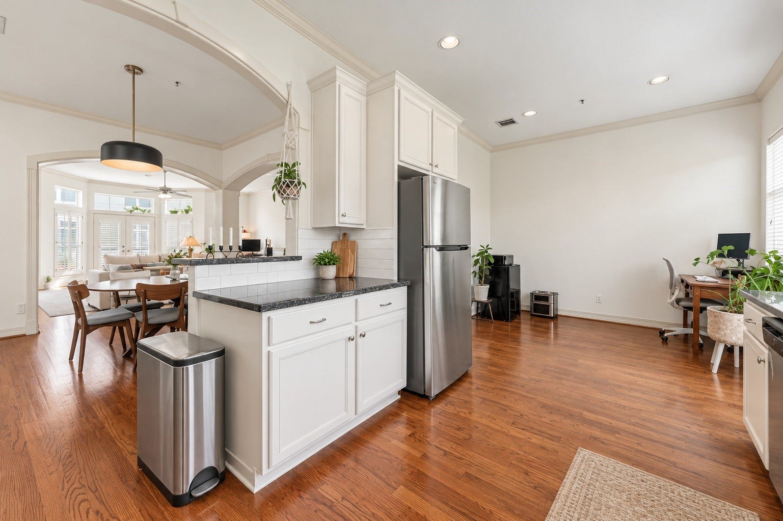 Freshly painted cabinets, new backsplash, SS appliances! Virtually staged/enhanced to show full potential
