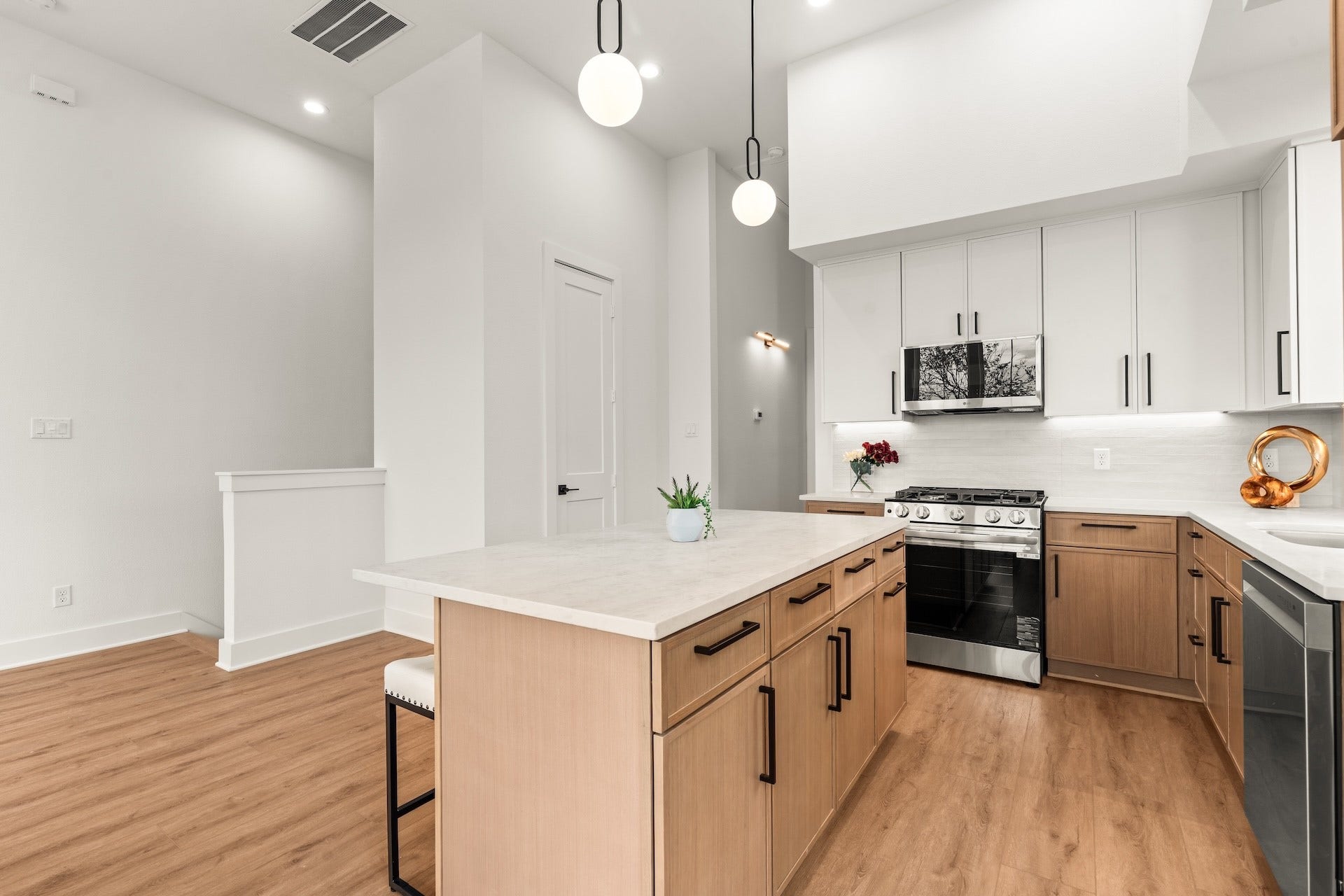 6619 Avenue Q, #A/B, Houston, TX 77011 Chef-inspired prep station featuring under-cabinet task lighting, soft-close storage, and a walk-in pantry.