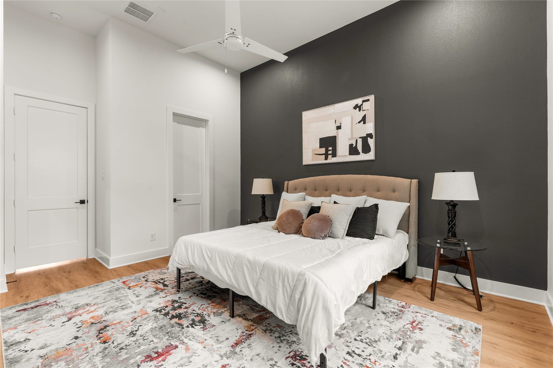 6619 Avenue Q, #A/B, Houston, TX 77011 Sprawling primary suite with high ceilings and direct private access to the ensuite bath.
