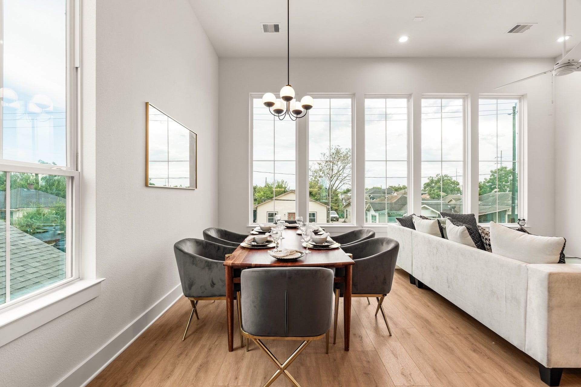 6619 Avenue Q, #A/B, Houston, TX 77011 Dedicated dining space positioned alongside massive windows for bright, inviting family meals.