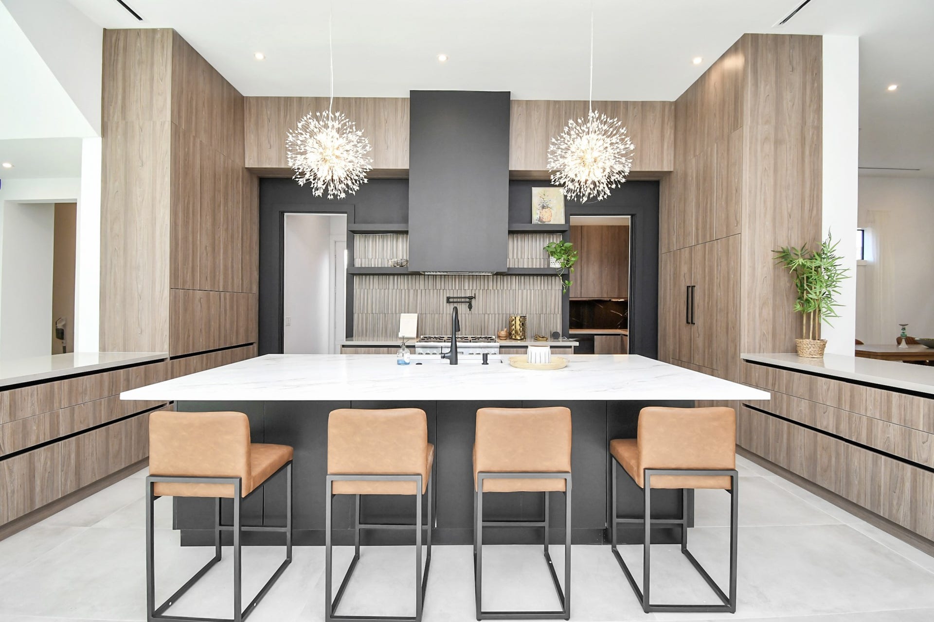 5414 John Dreaper Drive, Houston, TX 77056 European custom cabinets with a huge kitchen island.