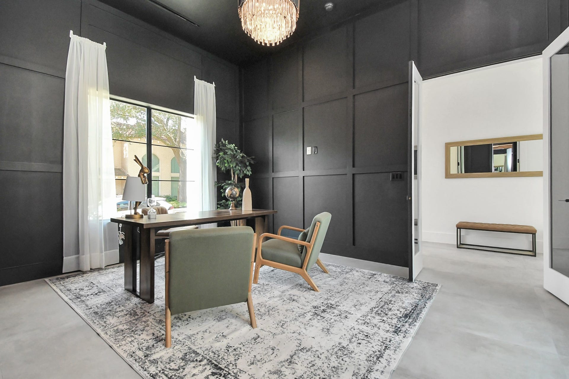 5414 John Dreaper Drive, Houston, TX 77056 Black wood paneled walls.