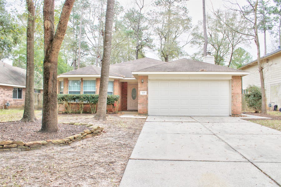 Property photo for 123 W Drifting Shadows Circle, Conroe, TX