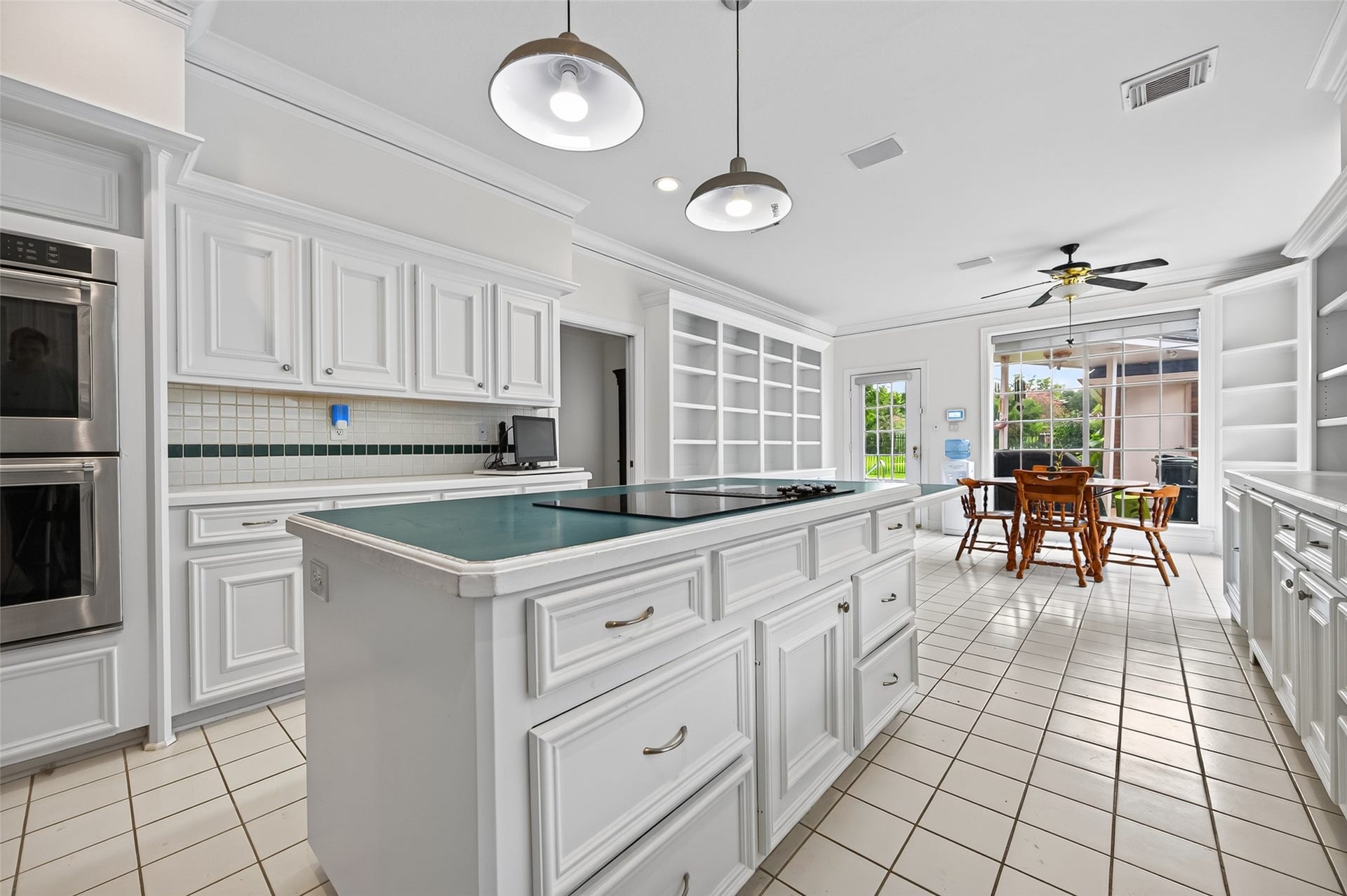 18 Tredington Street, Sugar Land, TX 77479 Spacious Kitchen offering crown molding throughout.